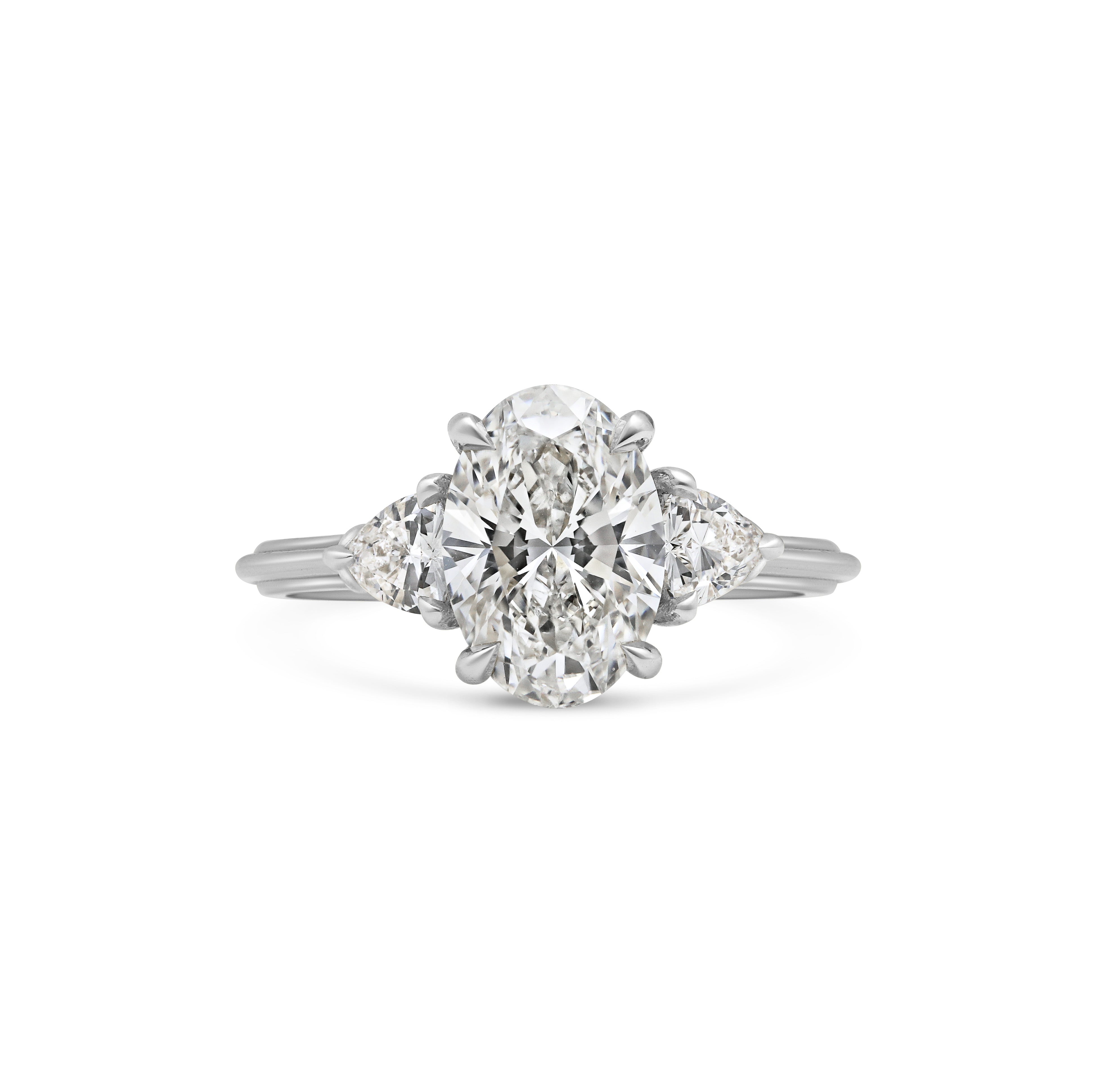 The Clara Ring - Oval Cut by East London jeweller Rachel Boston | Discover our collections of unique and timeless engagement rings, wedding rings, and modern fine jewellery.