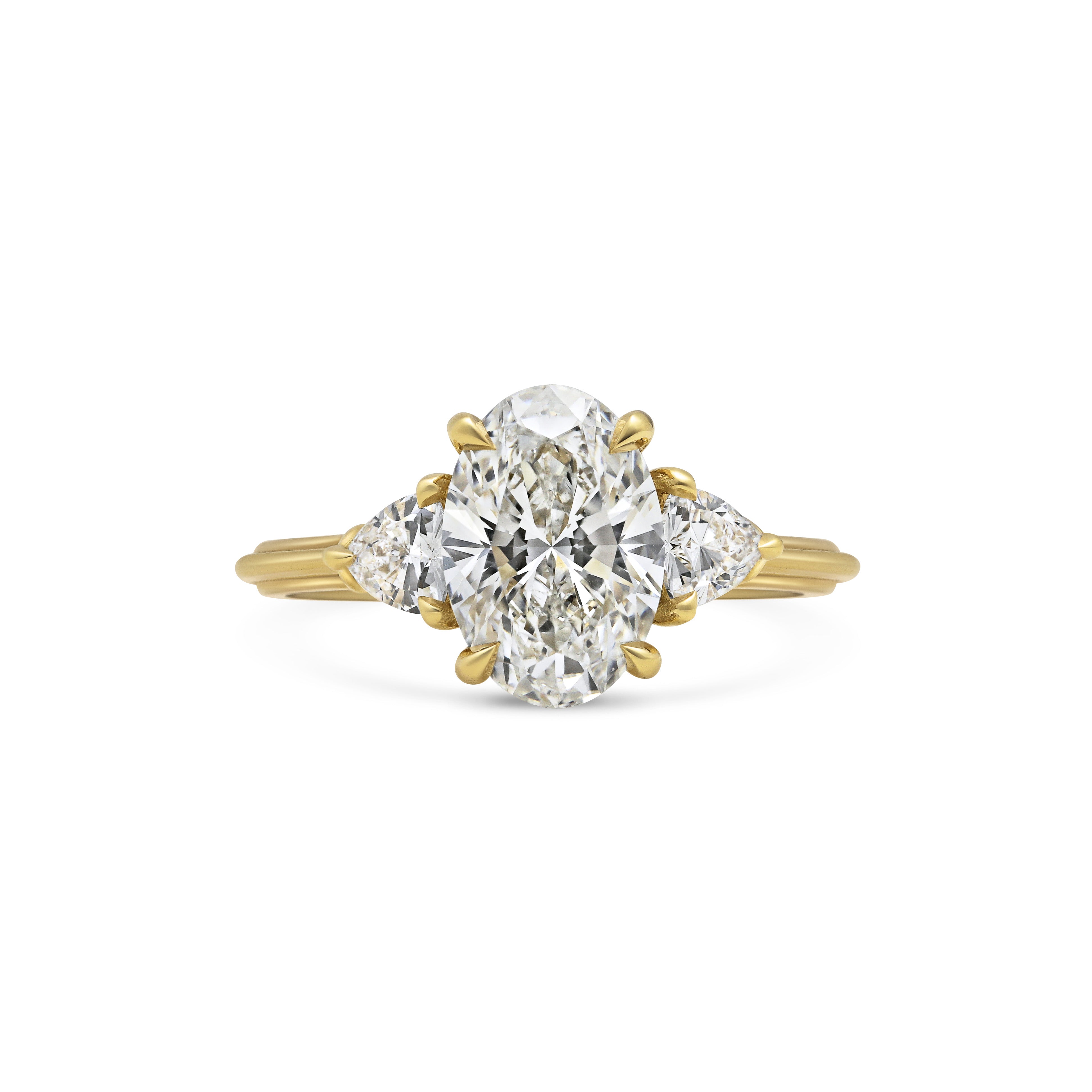 The Clara Ring - Oval Cut by East London jeweller Rachel Boston | Discover our collections of unique and timeless engagement rings, wedding rings, and modern fine jewellery.