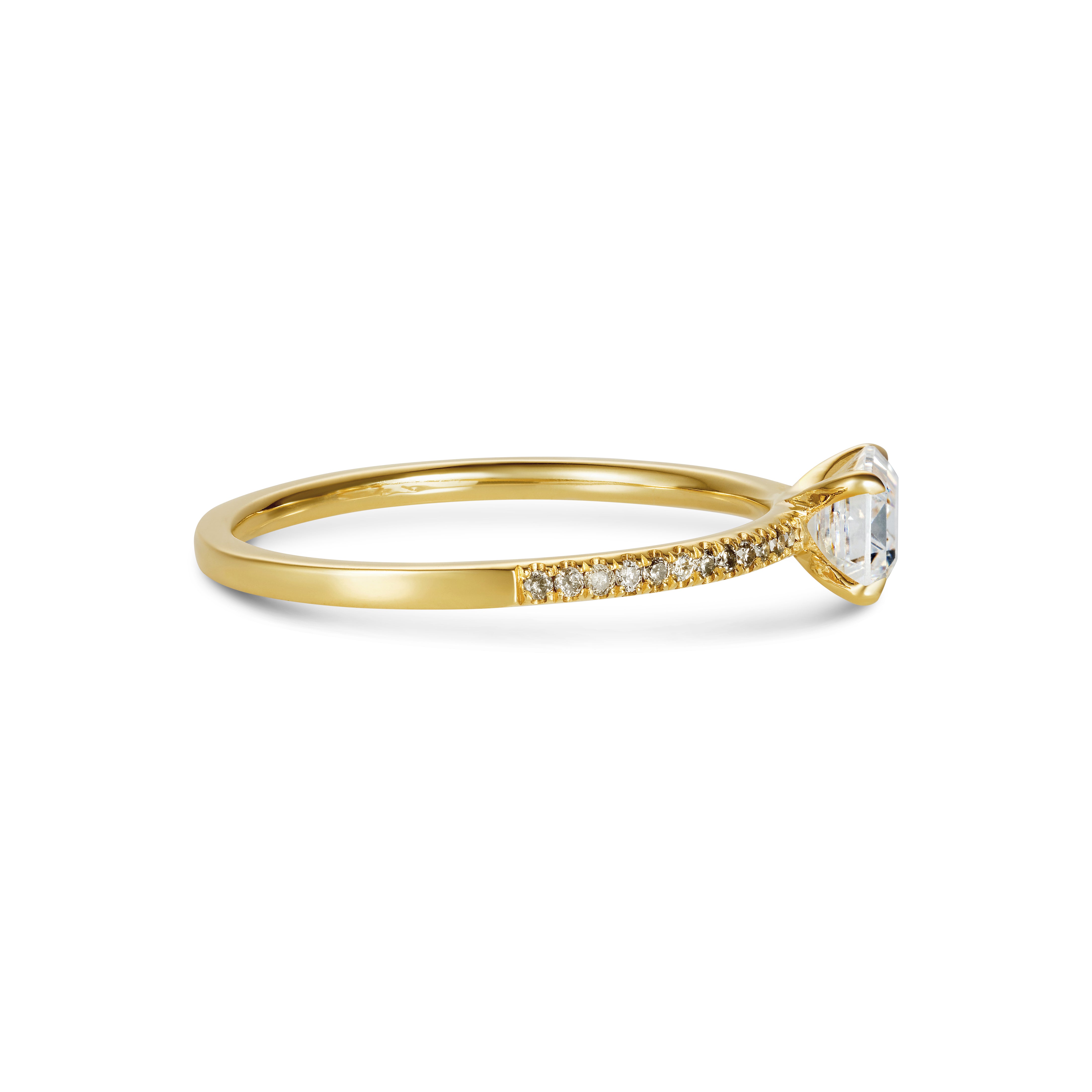 The Contra Emerald Ring by East London jeweller Rachel Boston | Discover our collections of unique and timeless engagement rings, wedding rings, and modern fine jewellery.