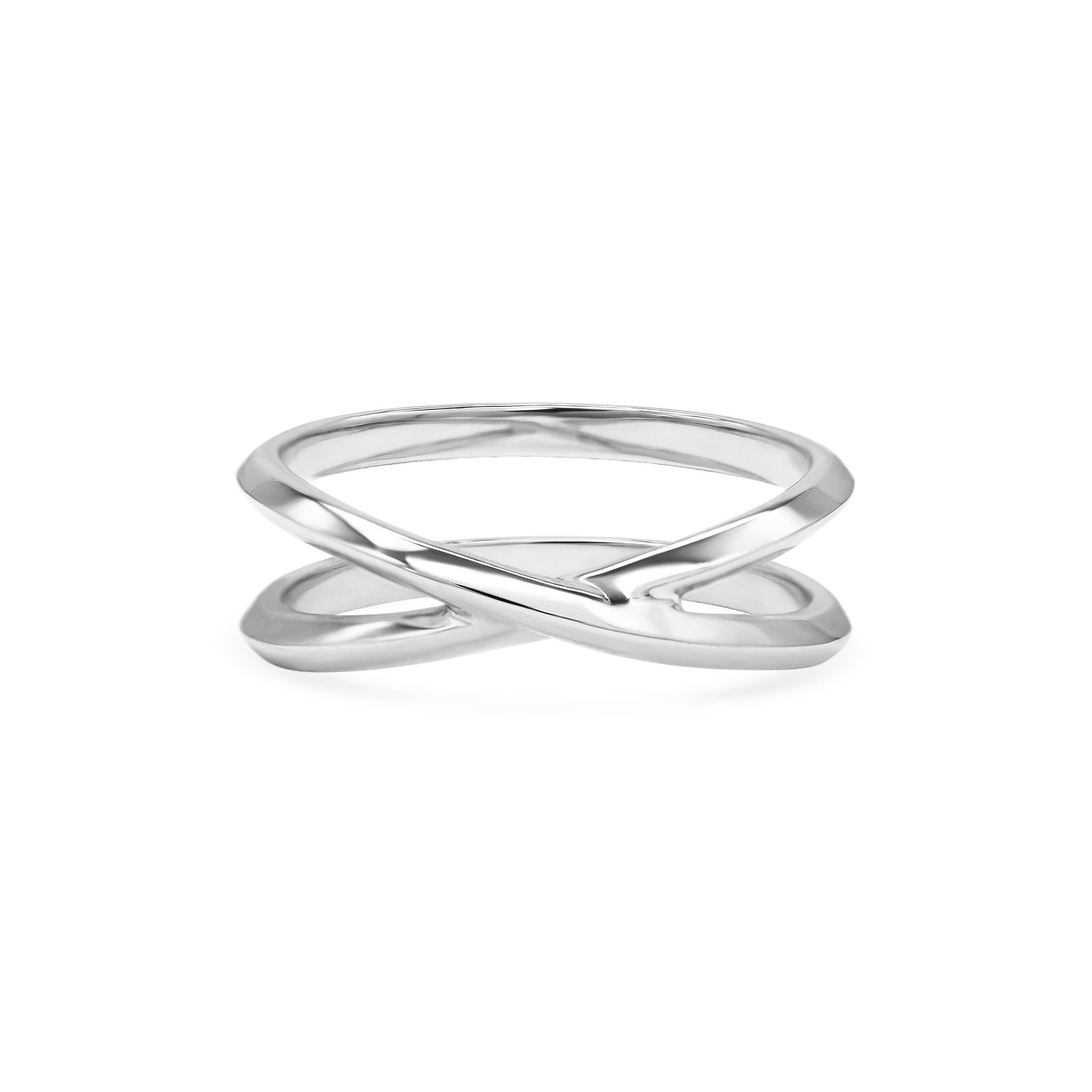 The Cross Ring by East London jeweller Rachel Boston | Discover our collections of unique and timeless engagement rings, wedding rings, and modern fine jewellery.