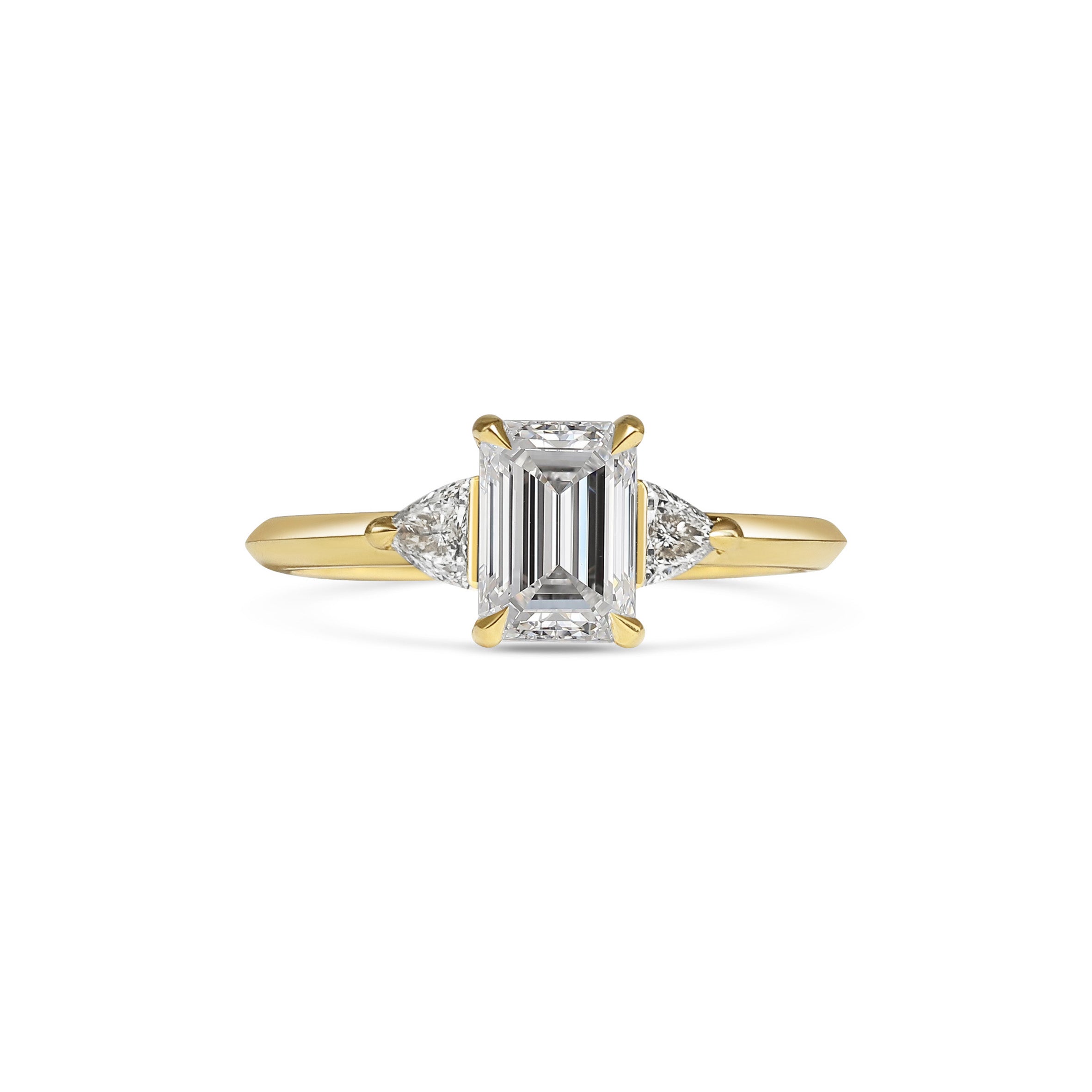 The Crux Ring - Emerald Cut by East London jeweller Rachel Boston | Discover our collections of unique and timeless engagement rings, wedding rings, and modern fine jewellery.