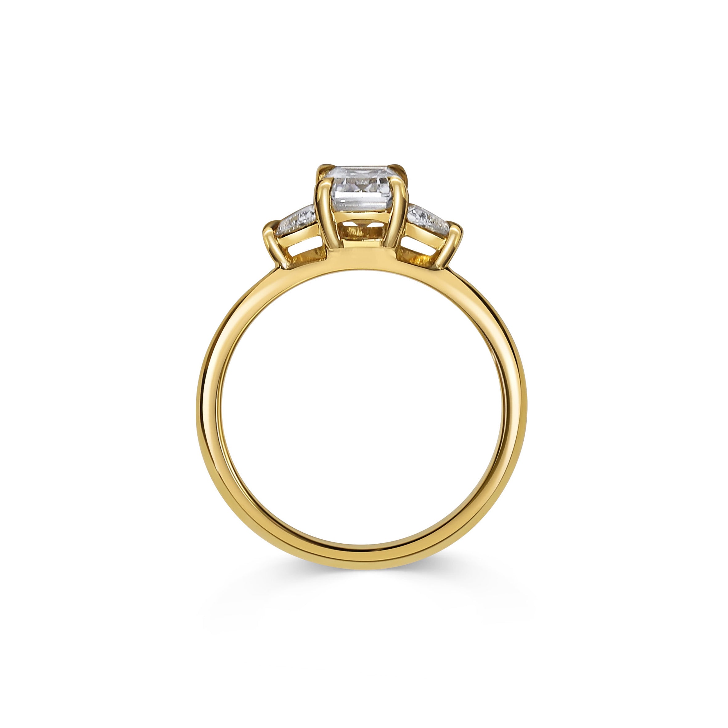 The Crux Ring - Emerald Cut by East London jeweller Rachel Boston | Discover our collections of unique and timeless engagement rings, wedding rings, and modern fine jewellery.