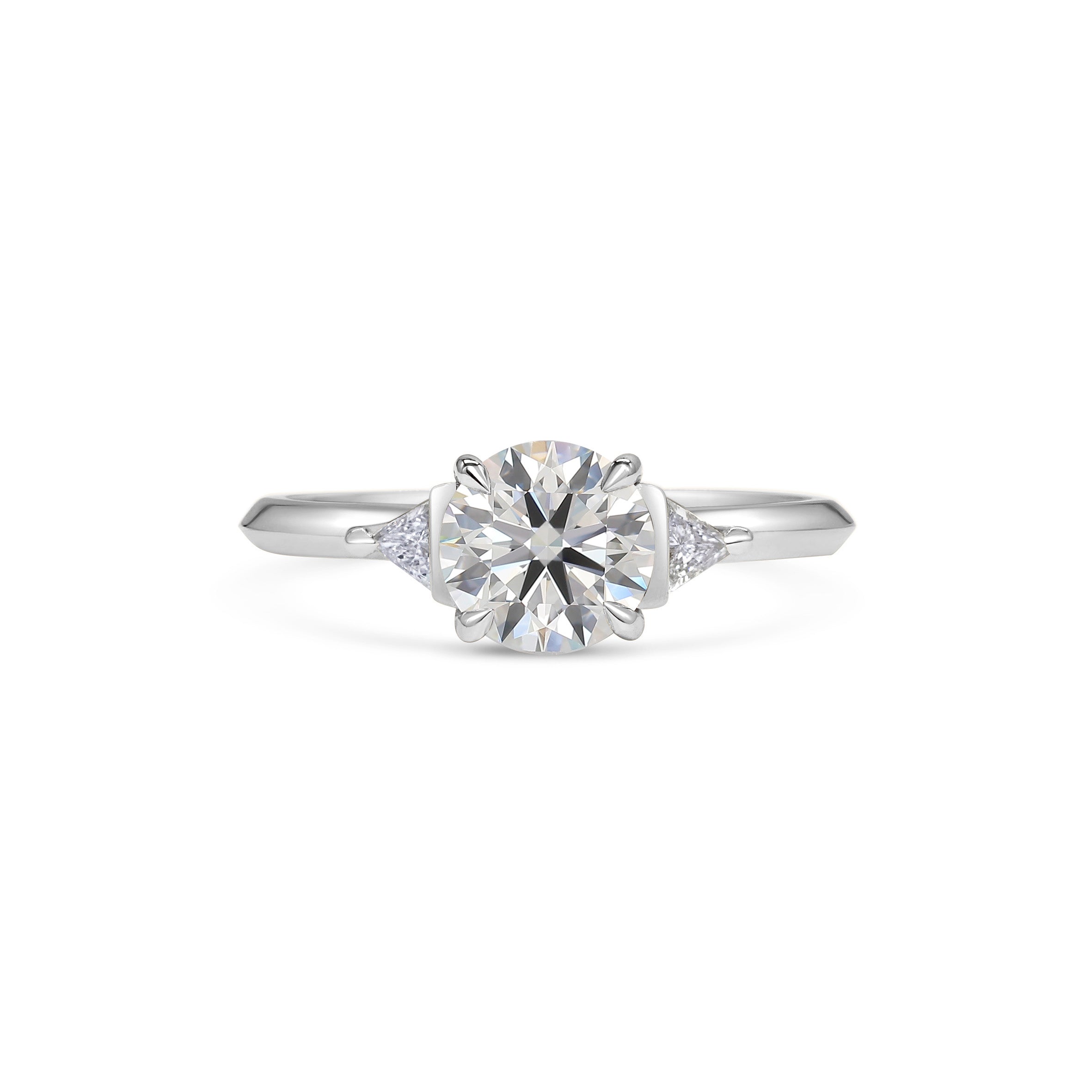 The Crux Ring - Round Cut by East London jeweller Rachel Boston | Discover our collections of unique and timeless engagement rings, wedding rings, and modern fine jewellery.