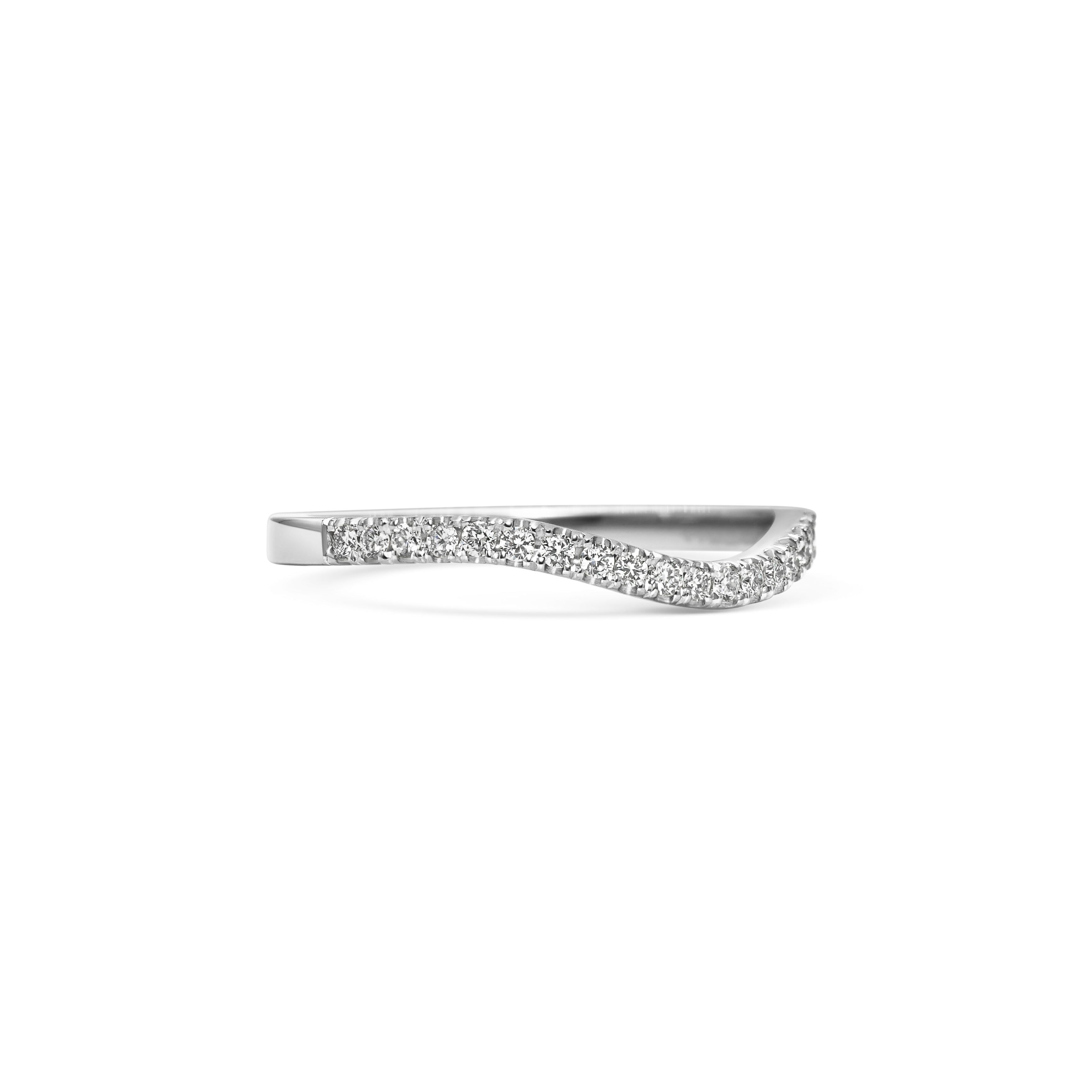 The Diamond Curve Band by East London jeweller Rachel Boston | Discover our collections of unique and timeless engagement rings, wedding rings, and modern fine jewellery.