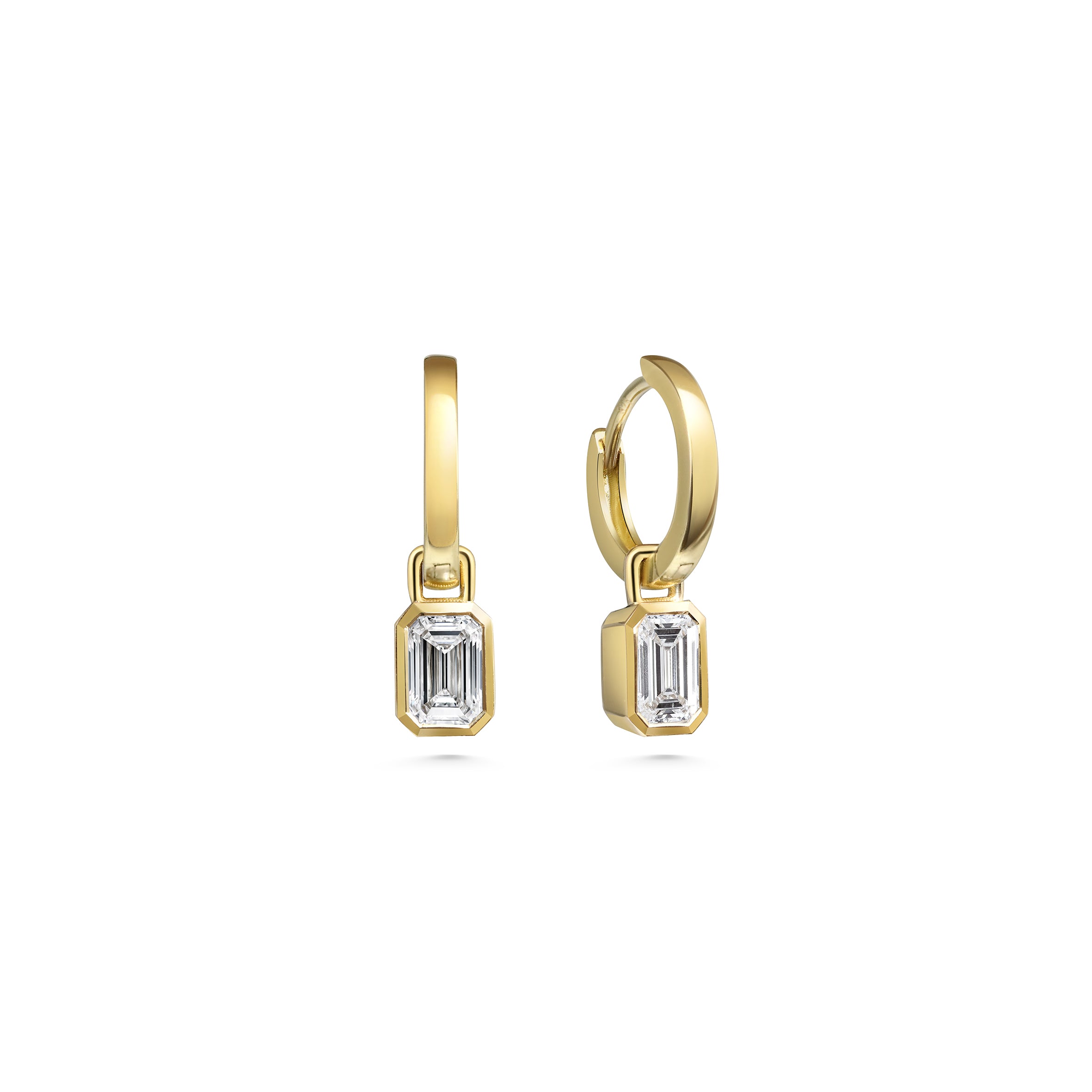 The Emerald Cut Chunky Dropper Earrings by East London jeweller Rachel Boston | Discover our collections of unique and timeless engagement rings, wedding rings, and modern fine jewellery.