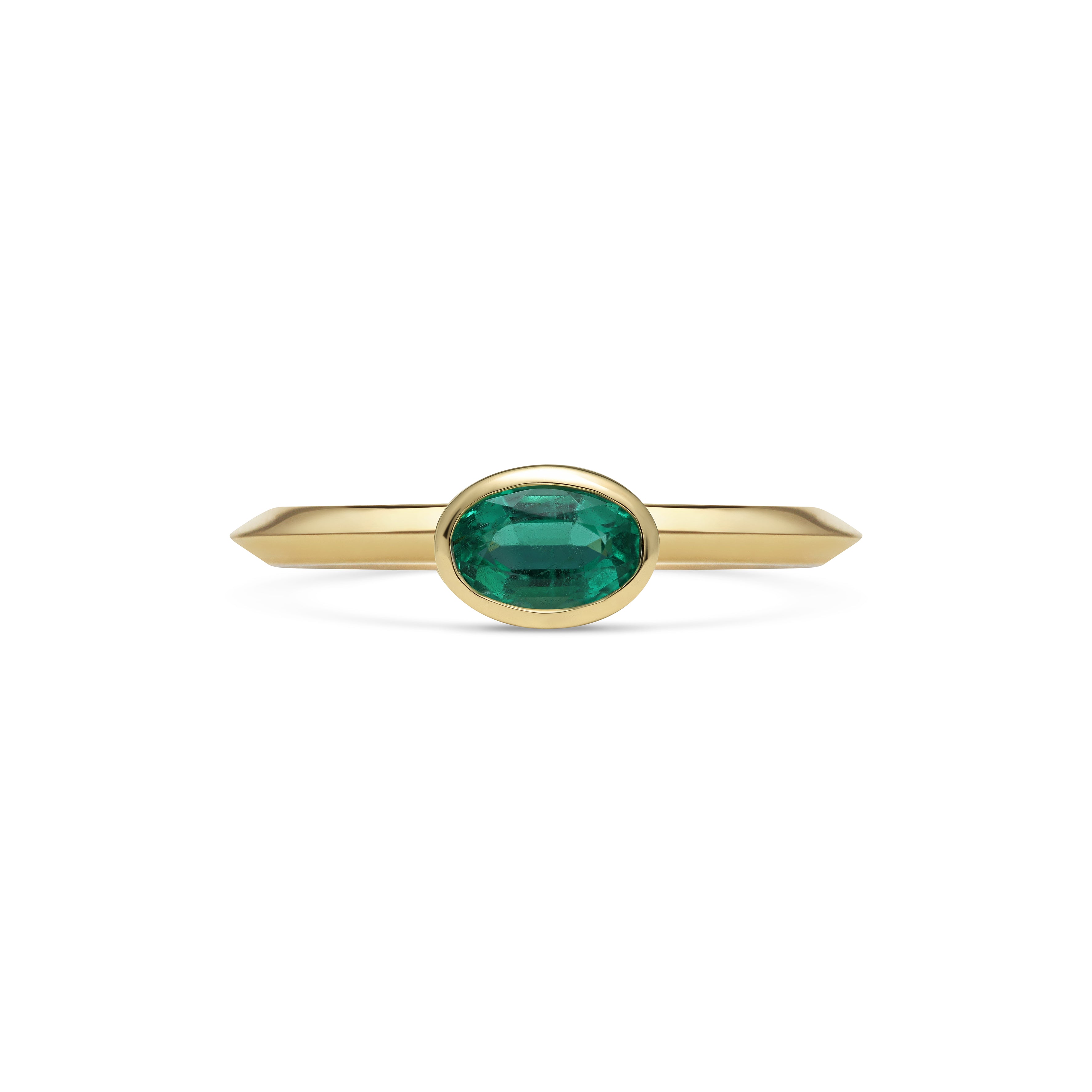 The Emerald Rubover Knife Edge Ring by East London jeweller Rachel Boston | Discover our collections of unique and timeless engagement rings, wedding rings, and modern fine jewellery.