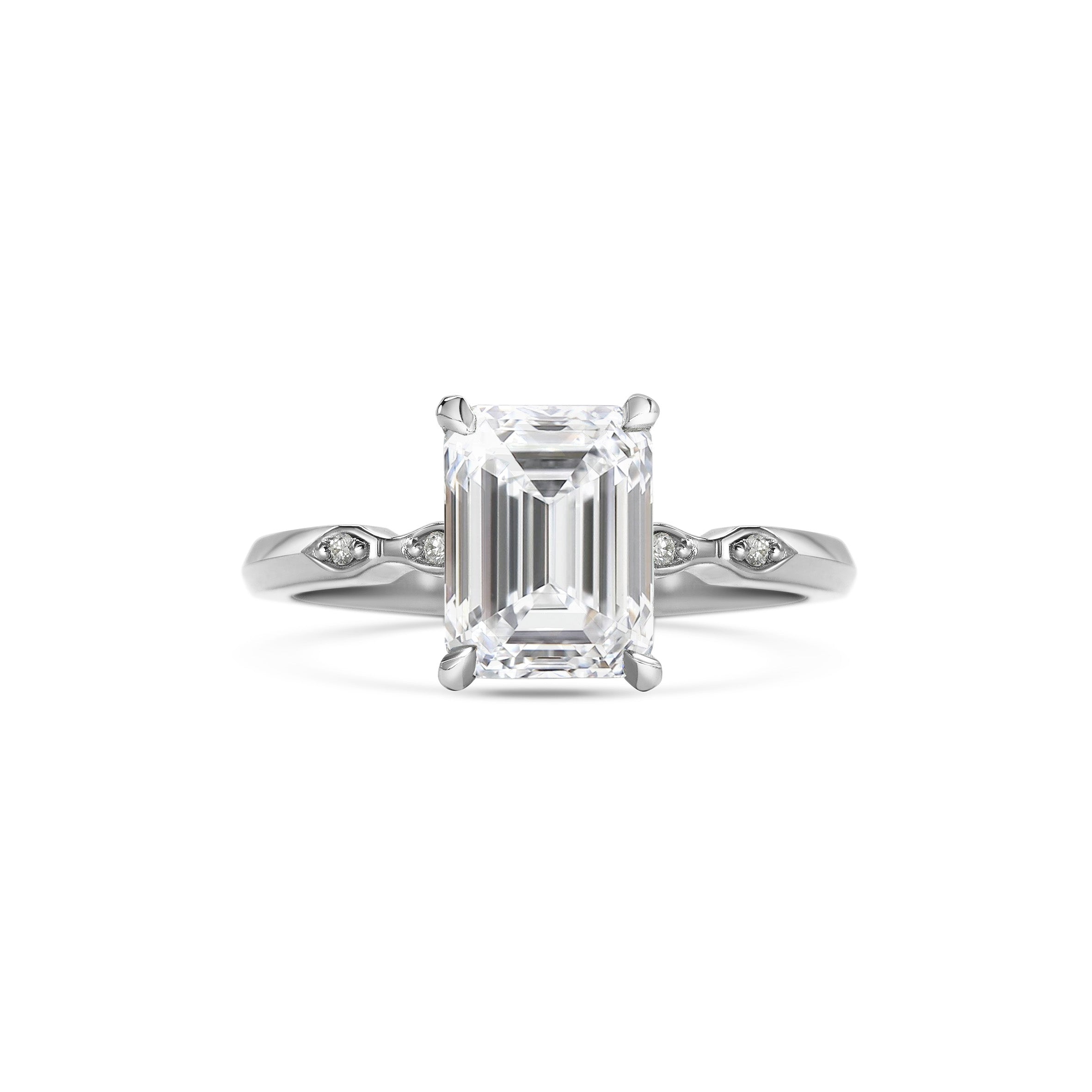 The Evelyn - Emerald Ring by East London jeweller Rachel Boston | Discover our collections of unique and timeless engagement rings, wedding rings, and modern fine jewellery.