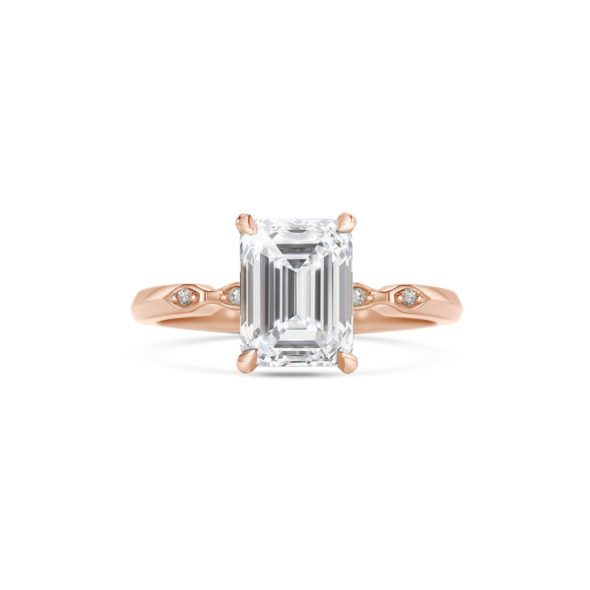 The Evelyn - Emerald Ring by East London jeweller Rachel Boston | Discover our collections of unique and timeless engagement rings, wedding rings, and modern fine jewellery.