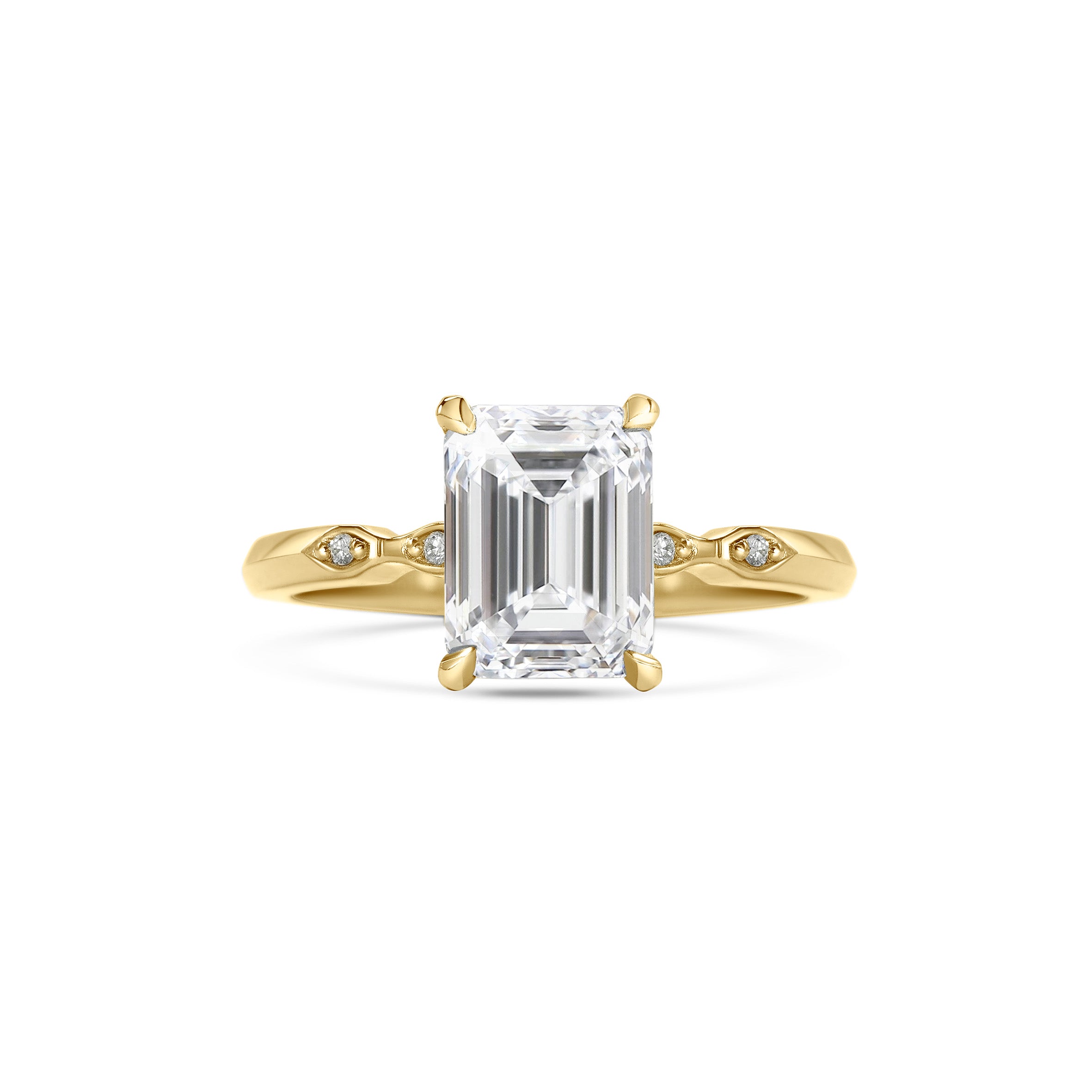 The Evelyn - Emerald Ring by East London jeweller Rachel Boston | Discover our collections of unique and timeless engagement rings, wedding rings, and modern fine jewellery.
