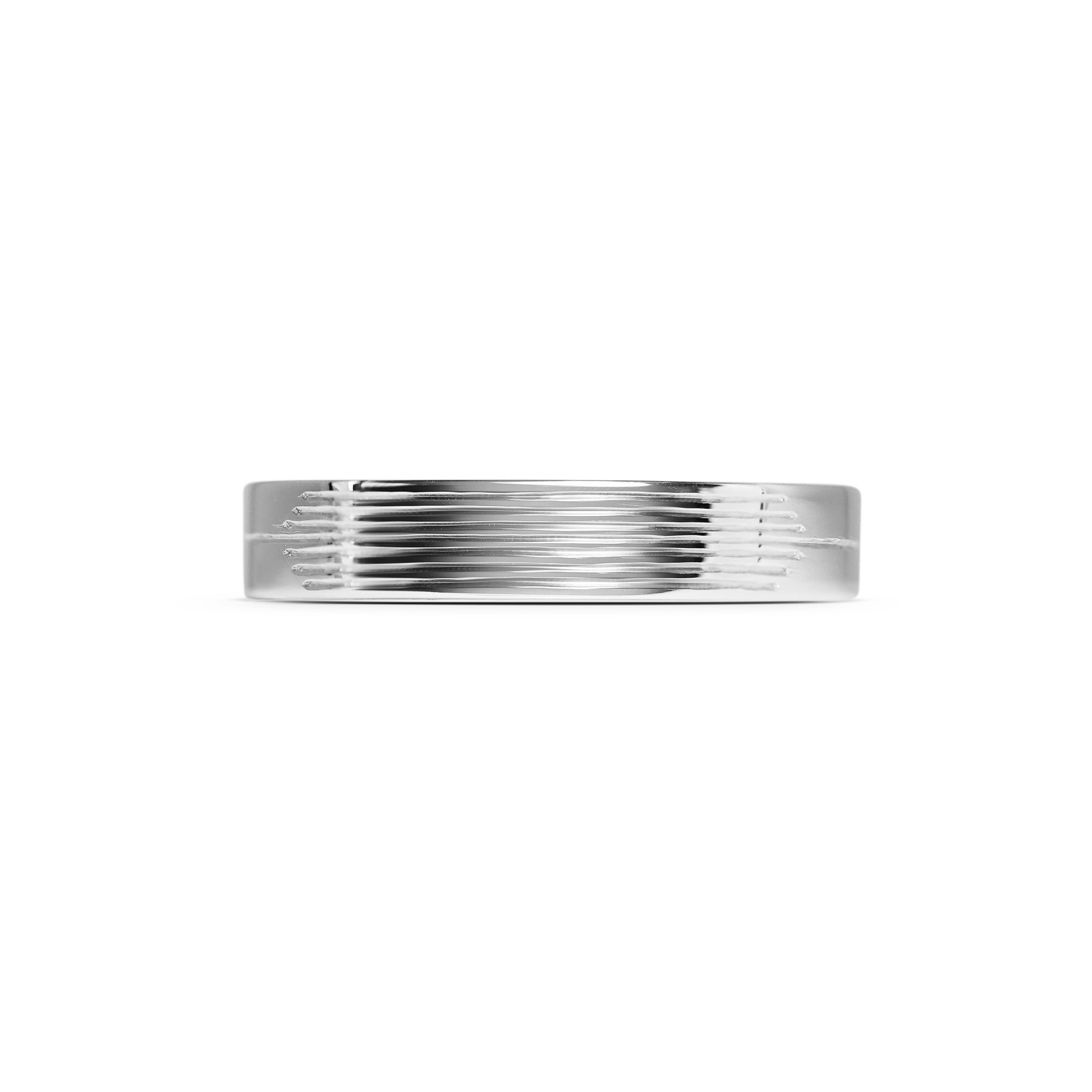 The Stream Engraved Flat Band - 4mm by East London jeweller Rachel Boston | Discover our collections of unique and timeless engagement rings, wedding rings, and modern fine jewellery.