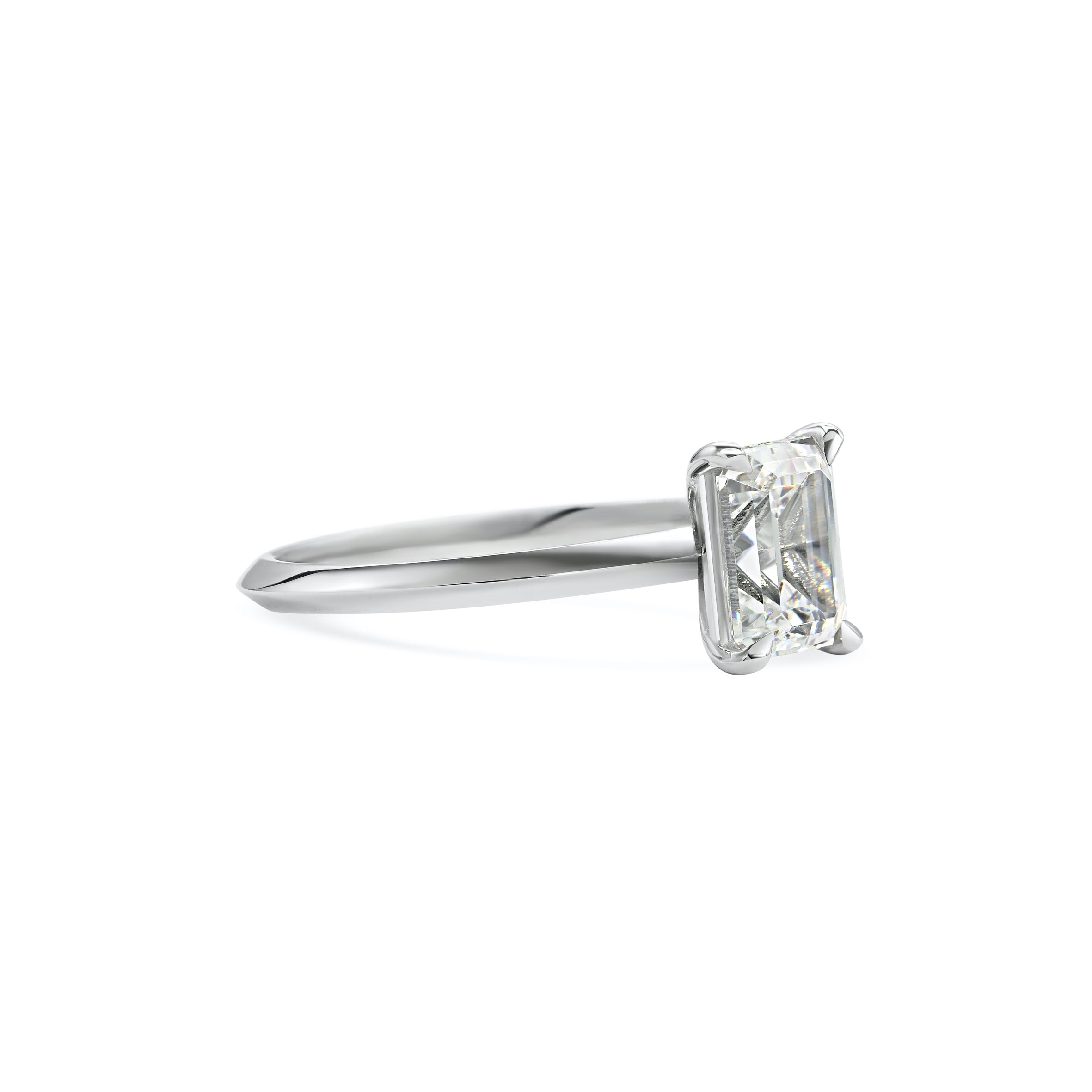 The Grace Ring - Emerald Cut by East London jeweller Rachel Boston | Discover our collections of unique and timeless engagement rings, wedding rings, and modern fine jewellery.