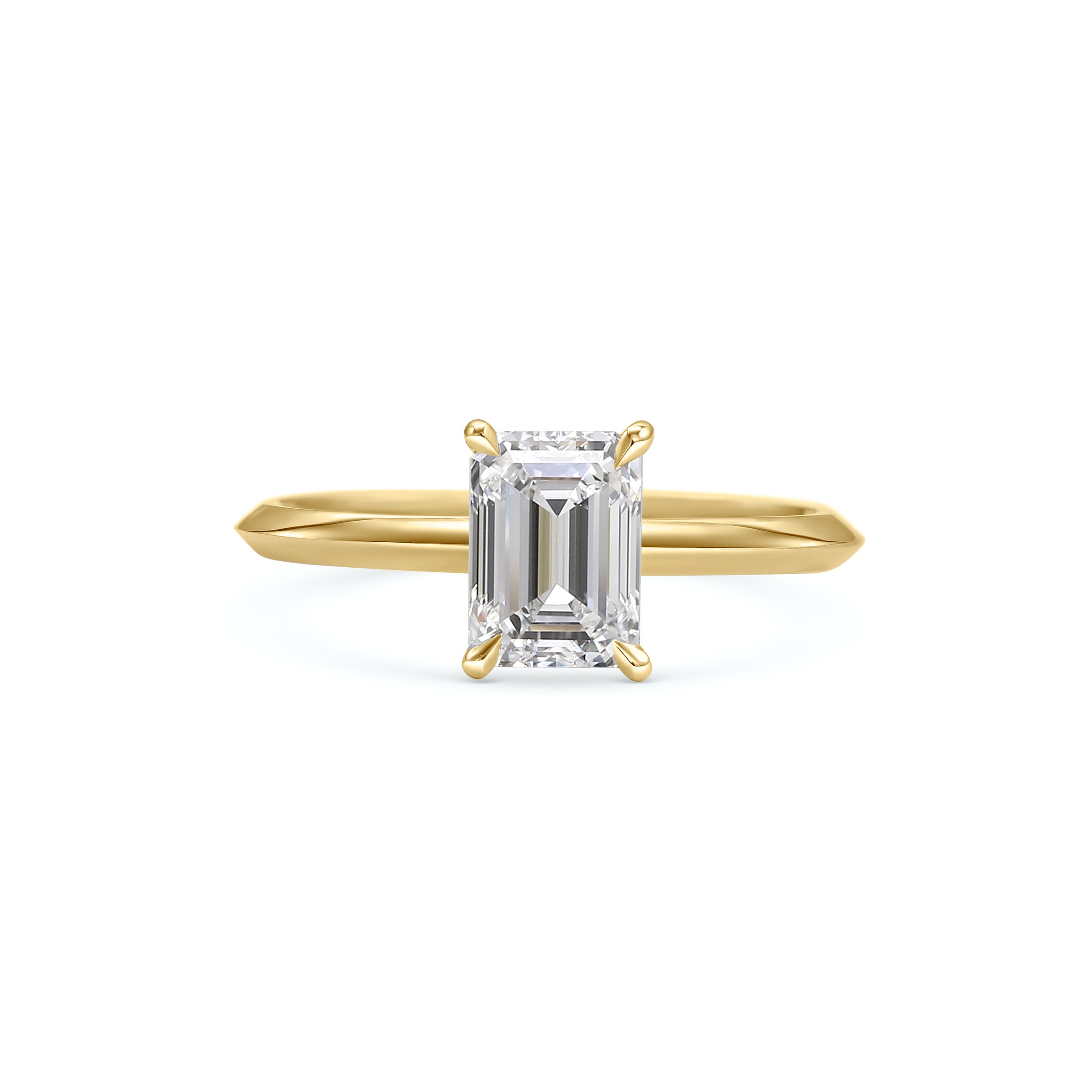The Grace Ring - Emerald Cut by East London jeweller Rachel Boston | Discover our collections of unique and timeless engagement rings, wedding rings, and modern fine jewellery.