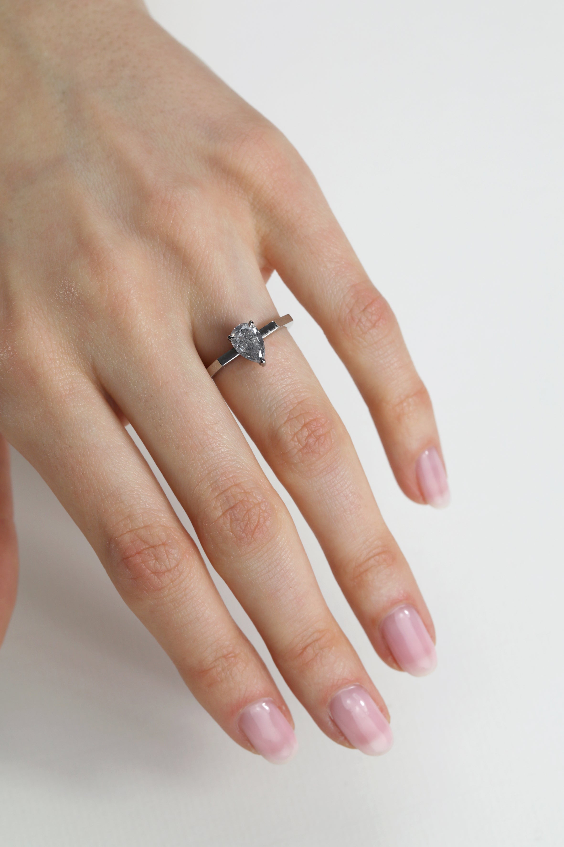 The Grey Pear Deco Ring by East London jeweller Rachel Boston | Discover our collections of unique and timeless engagement rings, wedding rings, and modern fine jewellery.