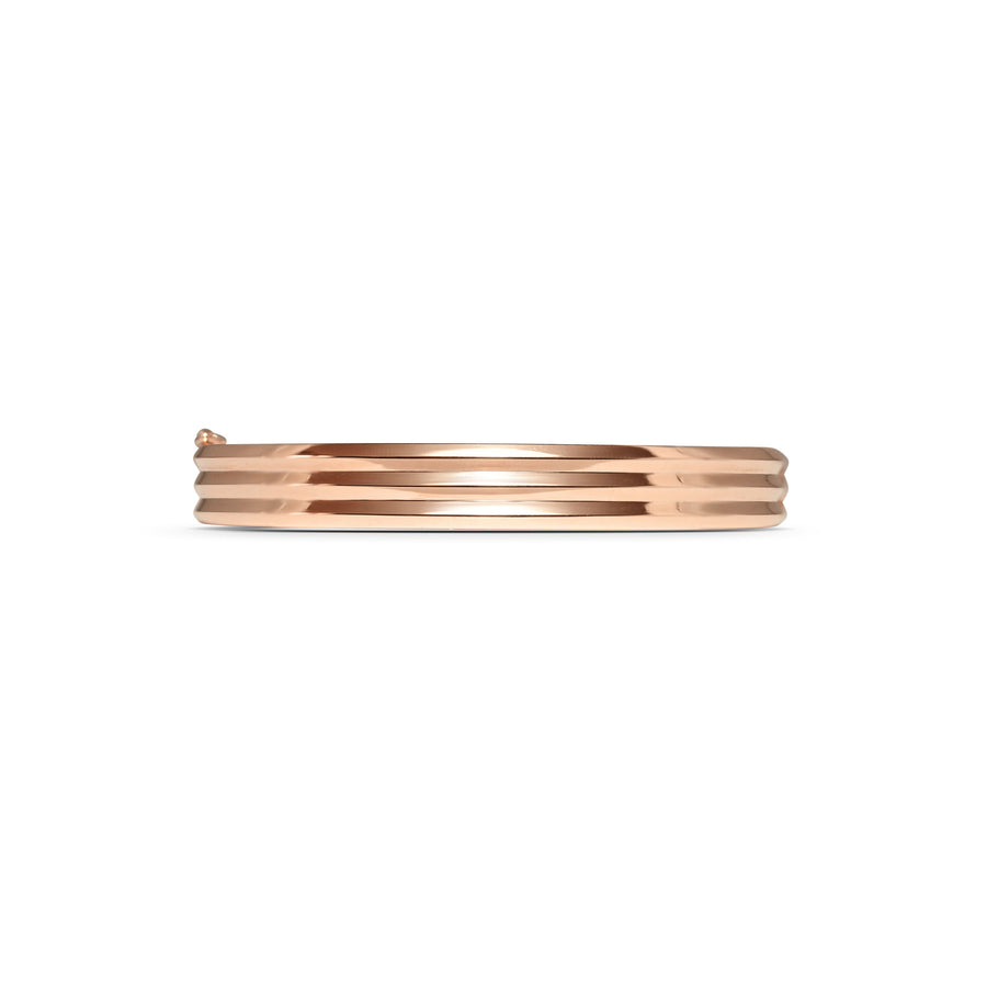 The Heavy Triple Knife Edge Bangle by East London jeweller Rachel Boston | Discover our collections of unique and timeless engagement rings, wedding rings, and modern fine jewellery. - Rachel Boston Jewellery