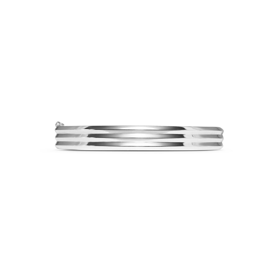 The Heavy Triple Knife Edge Bangle by East London jeweller Rachel Boston | Discover our collections of unique and timeless engagement rings, wedding rings, and modern fine jewellery. - Rachel Boston Jewellery