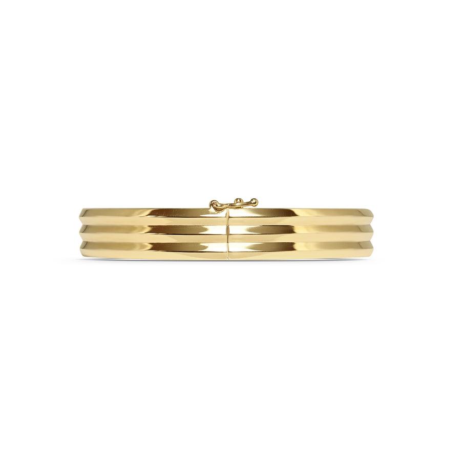 The Heavy Triple Knife Edge Bangle by East London jeweller Rachel Boston | Discover our collections of unique and timeless engagement rings, wedding rings, and modern fine jewellery. - Rachel Boston Jewellery