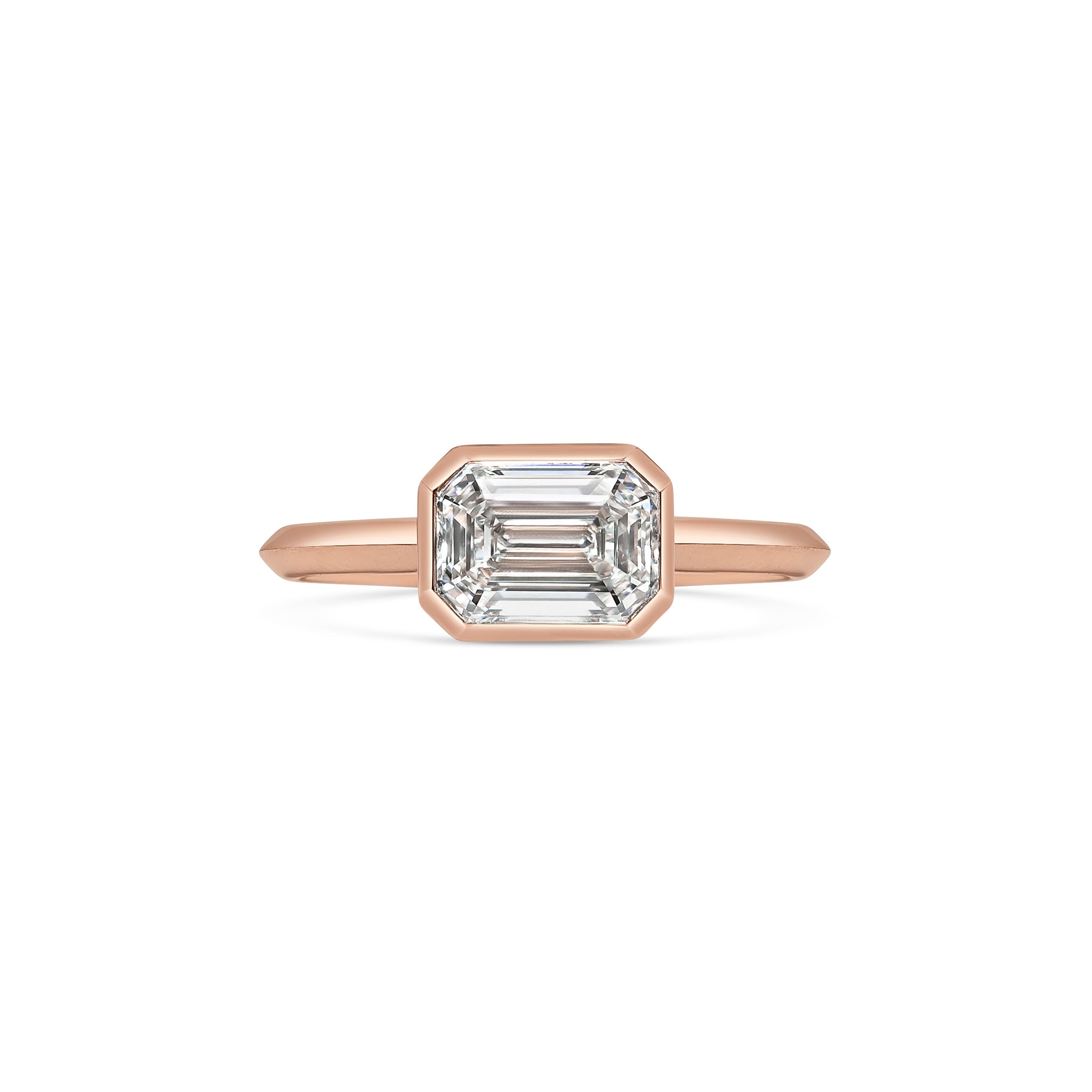 The Ines Ring - Emerald Cut by East London jeweller Rachel Boston | Discover our collections of unique and timeless engagement rings, wedding rings, and modern fine jewellery.