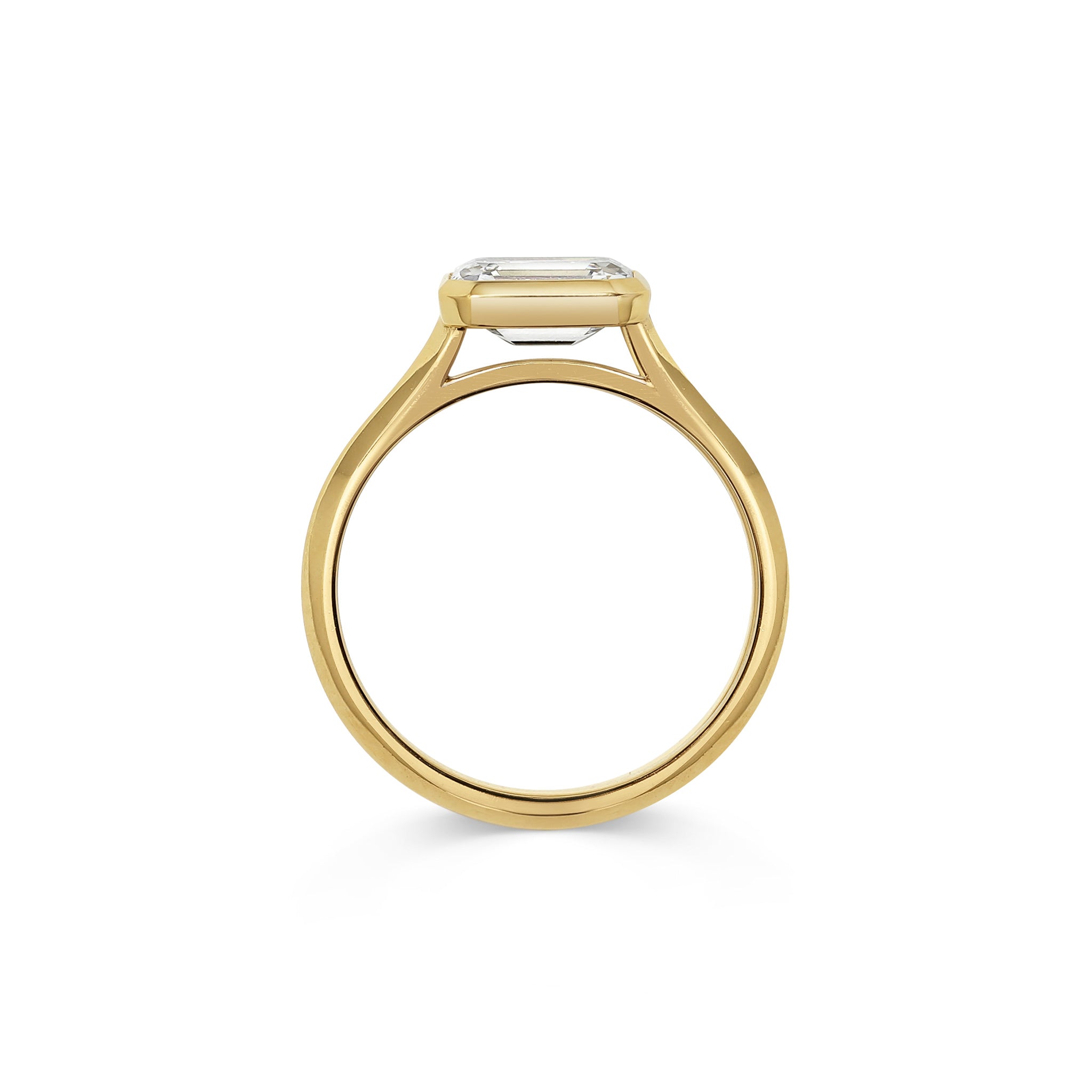 The Ines Ring - Emerald Cut by East London jeweller Rachel Boston | Discover our collections of unique and timeless engagement rings, wedding rings, and modern fine jewellery.