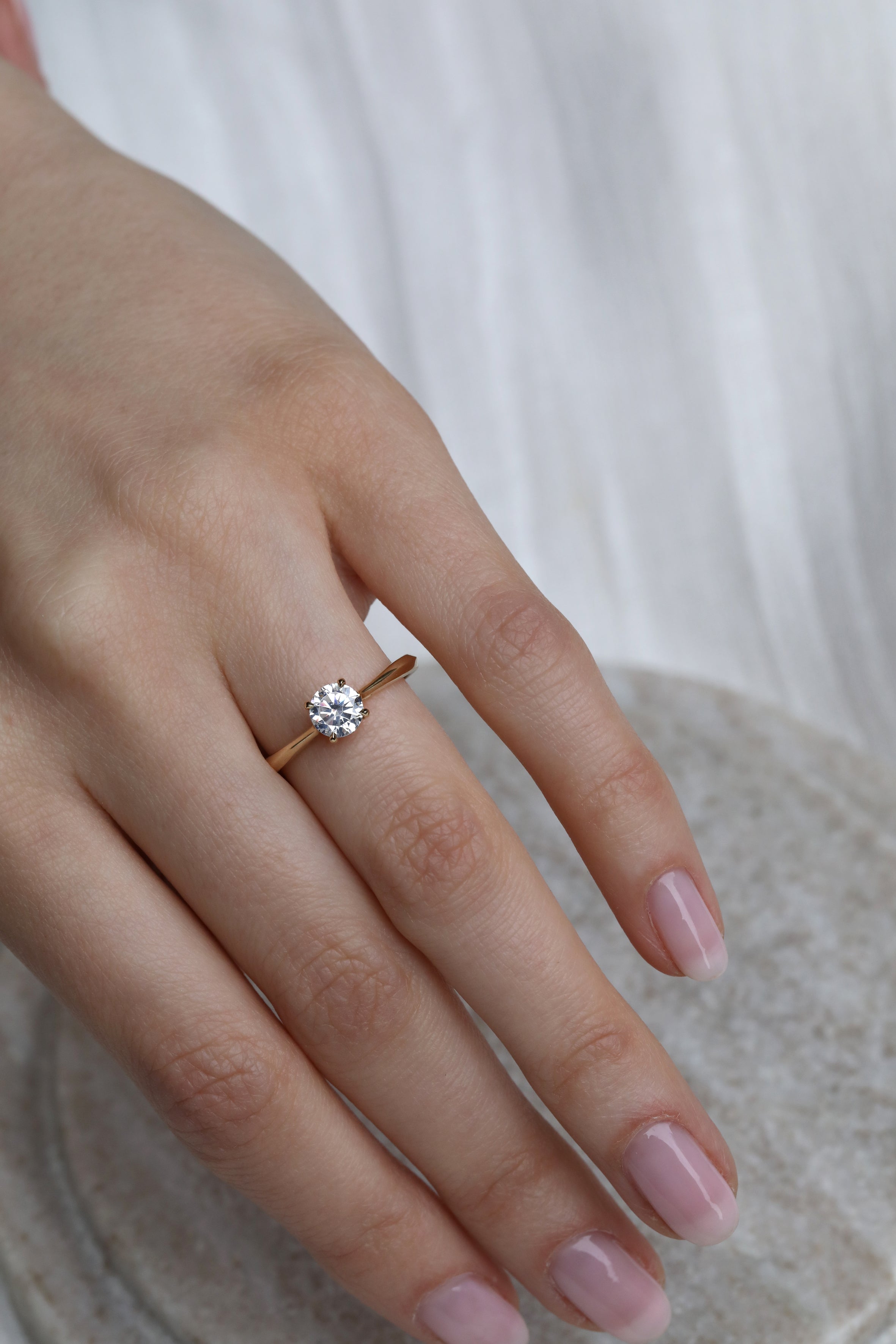 The Joy Ring - Round Cut by East London jeweller Rachel Boston | Discover our collections of unique and timeless engagement rings, wedding rings, and modern fine jewellery.