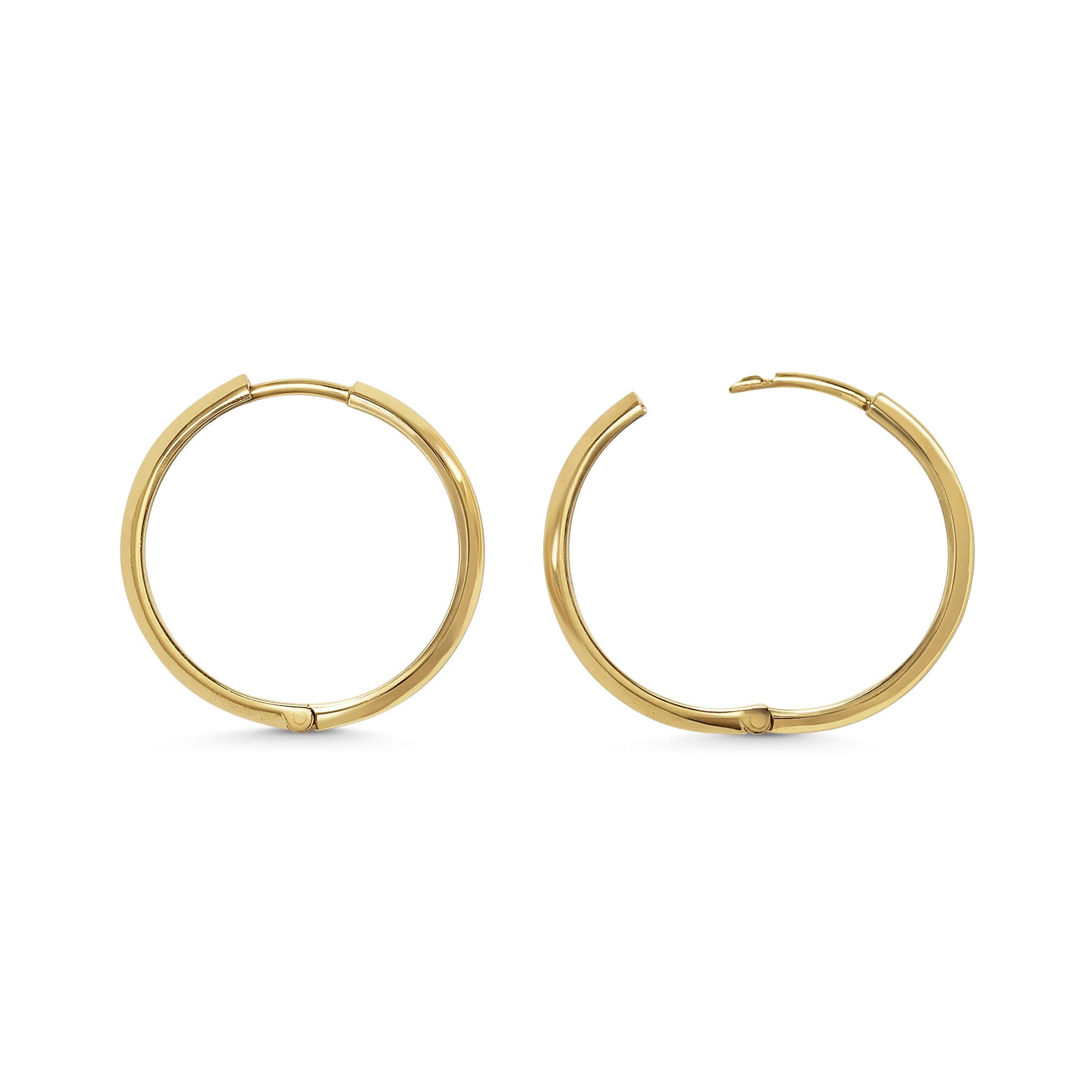The 20mm Knife Edge Hoop Earrings by East London jeweller Rachel Boston | Discover our collections of unique and timeless engagement rings, wedding rings, and modern fine jewellery.