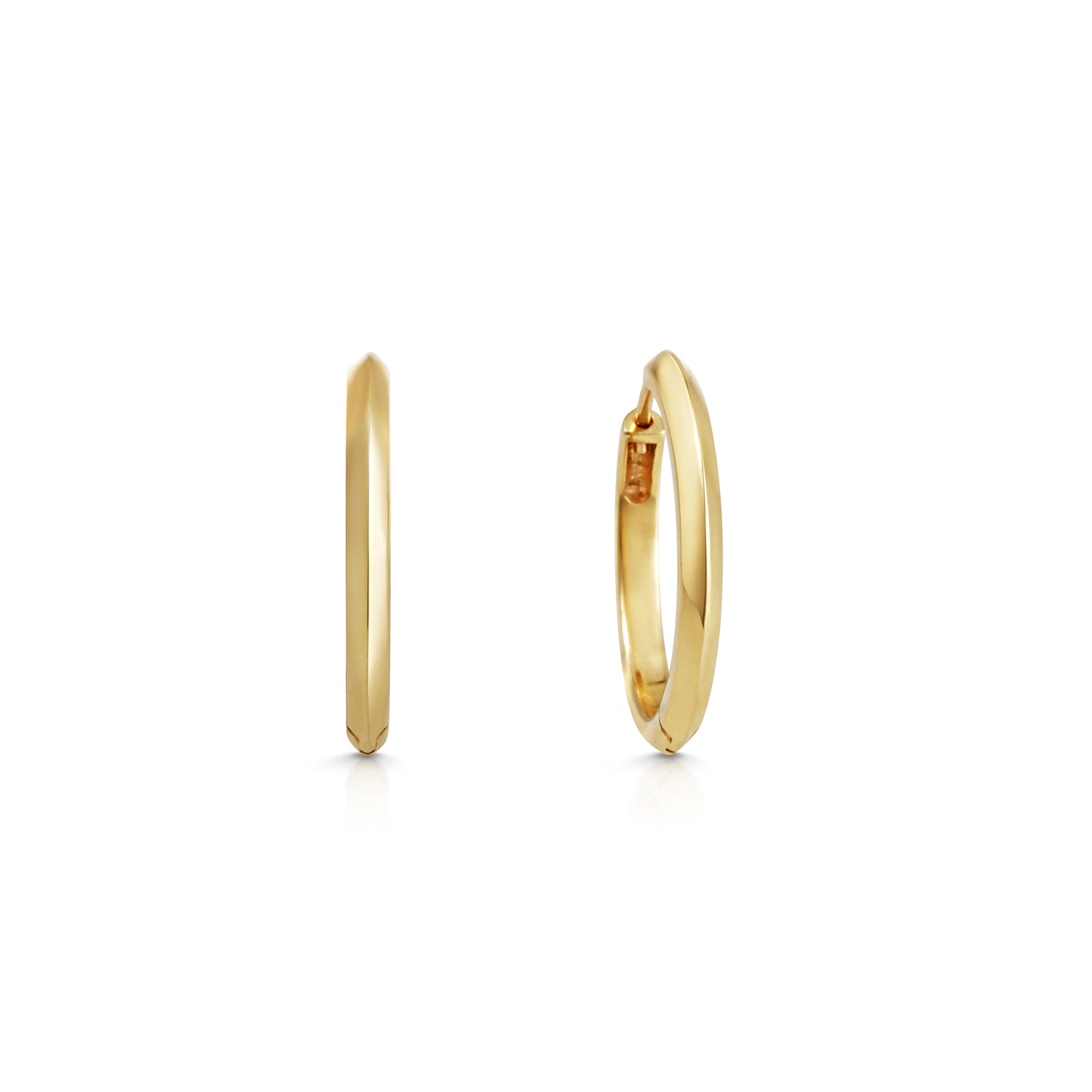 The 20mm Knife Edge Hoop Earrings by East London jeweller Rachel Boston | Discover our collections of unique and timeless engagement rings, wedding rings, and modern fine jewellery.
