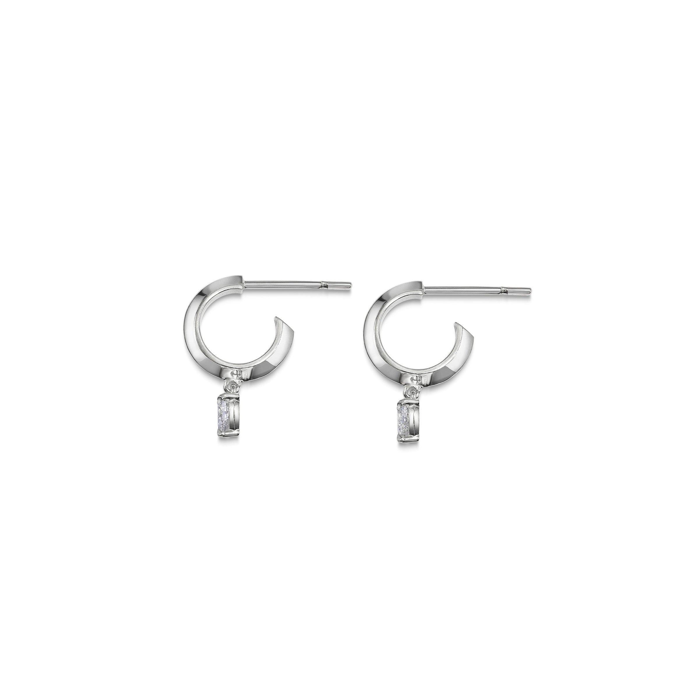 The Knife Edge Hoop Earrings with Pear Diamonds by East London jeweller Rachel Boston | Discover our collections of unique and timeless engagement rings, wedding rings, and modern fine jewellery.