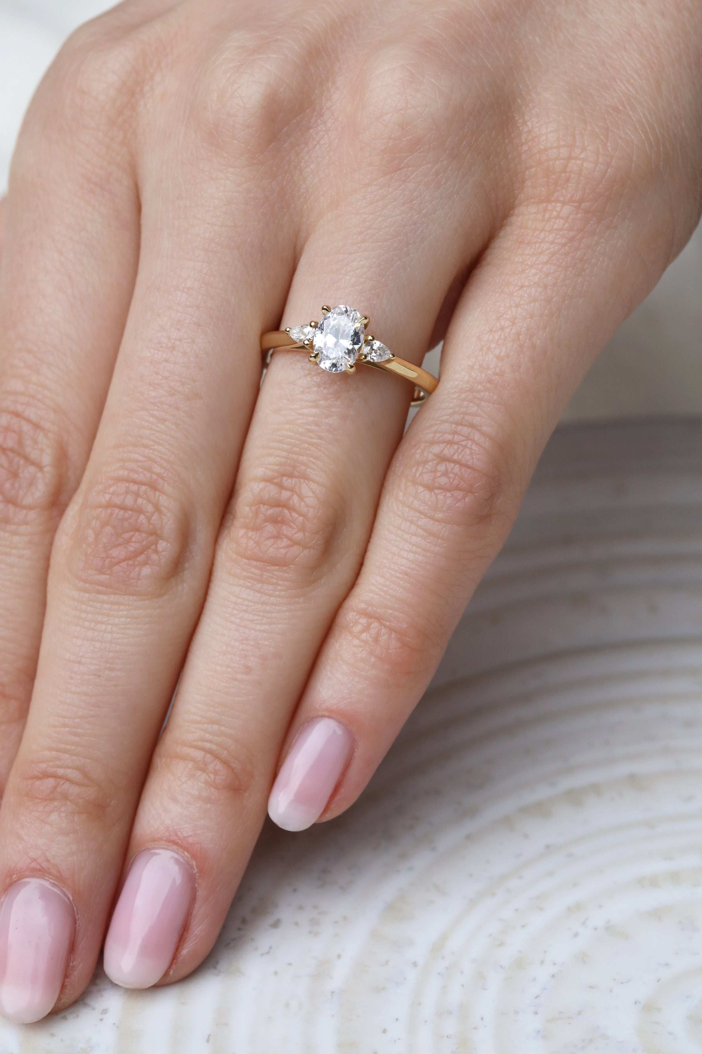 The Lucille Ring by East London jeweller Rachel Boston | Discover our collections of unique and timeless engagement rings, wedding rings, and modern fine jewellery.