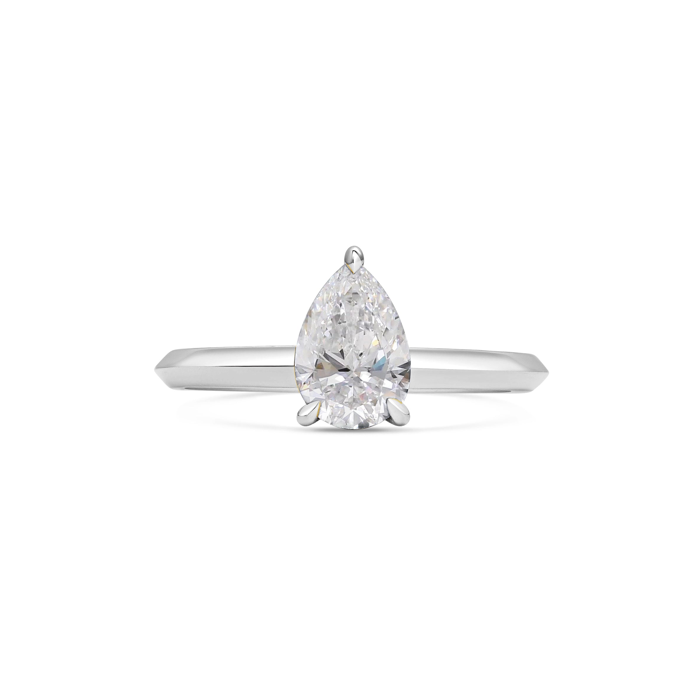 The Lyra Ring - Pear Cut by East London jeweller Rachel Boston | Discover our collections of unique and timeless engagement rings, wedding rings, and modern fine jewellery.