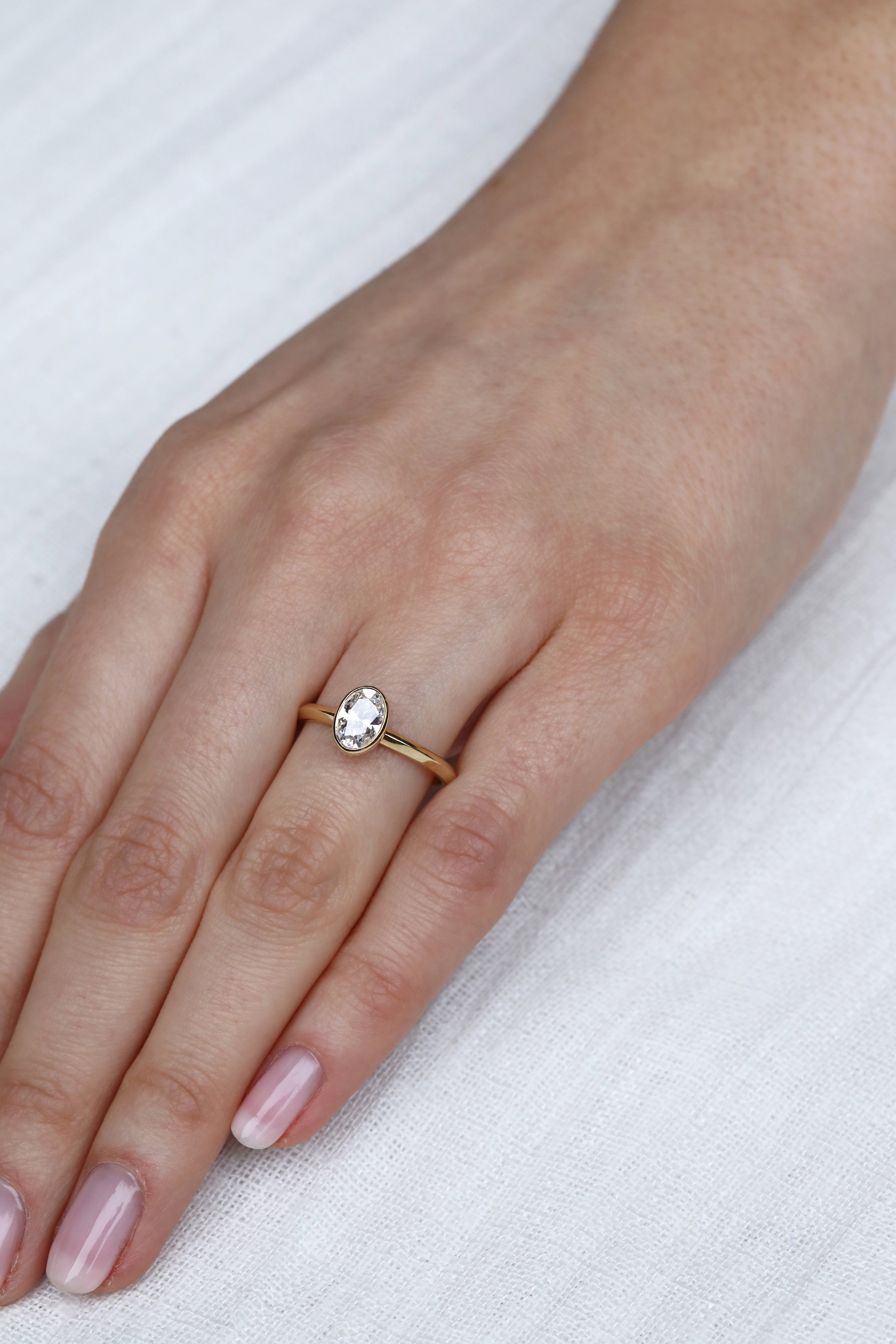 The Perseus Ring - Oval Cut by East London jeweller Rachel Boston | Discover our collections of unique and timeless engagement rings, wedding rings, and modern fine jewellery.