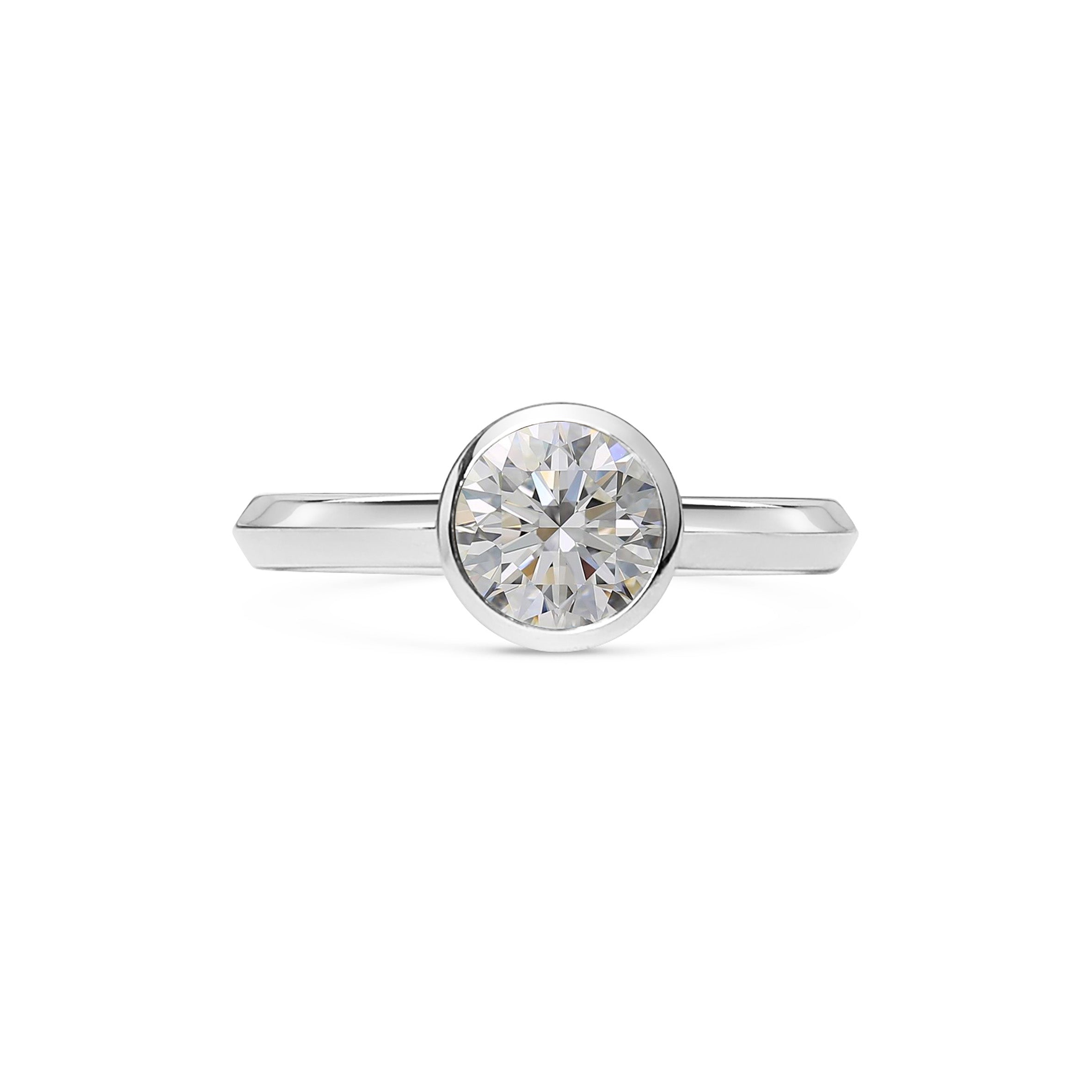 The Perseus Ring - Round Cut by East London jeweller Rachel Boston | Discover our collections of unique and timeless engagement rings, wedding rings, and modern fine jewellery.