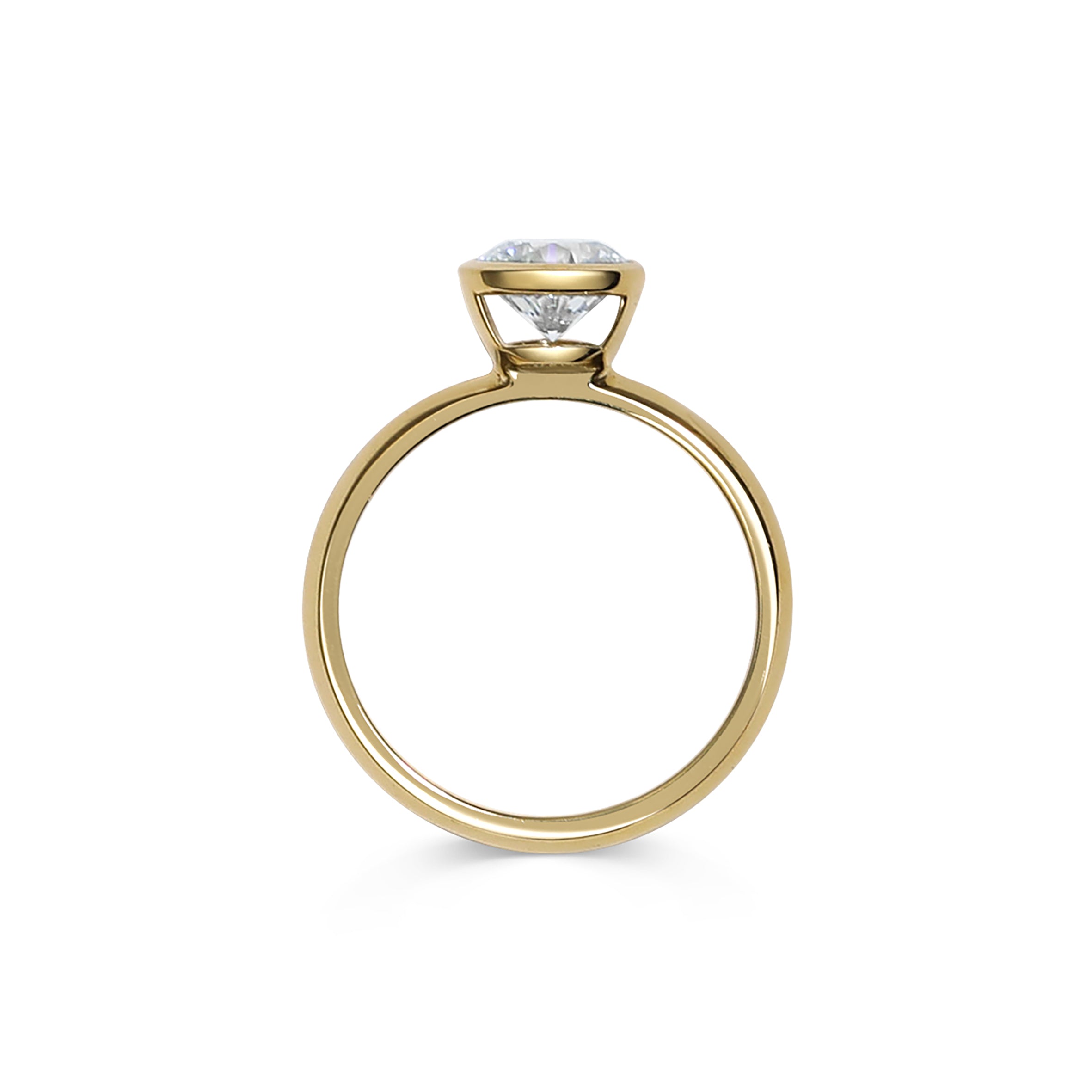 The Perseus Ring - Round Cut by East London jeweller Rachel Boston | Discover our collections of unique and timeless engagement rings, wedding rings, and modern fine jewellery.