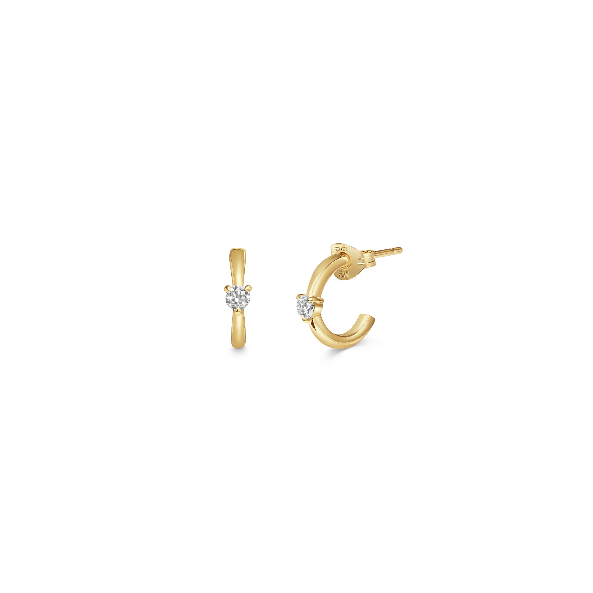 The Diamond Pinched Huggie Earrings by East London jeweller Rachel Boston | Discover our collections of unique and timeless engagement rings, wedding rings, and modern fine jewellery.