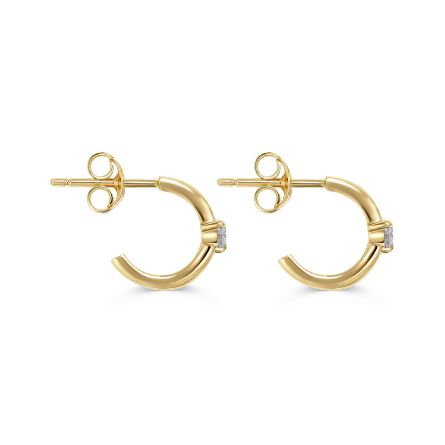 The Diamond Pinched Huggie Earrings by East London jeweller Rachel Boston | Discover our collections of unique and timeless engagement rings, wedding rings, and modern fine jewellery. - Rachel Boston Jewellery