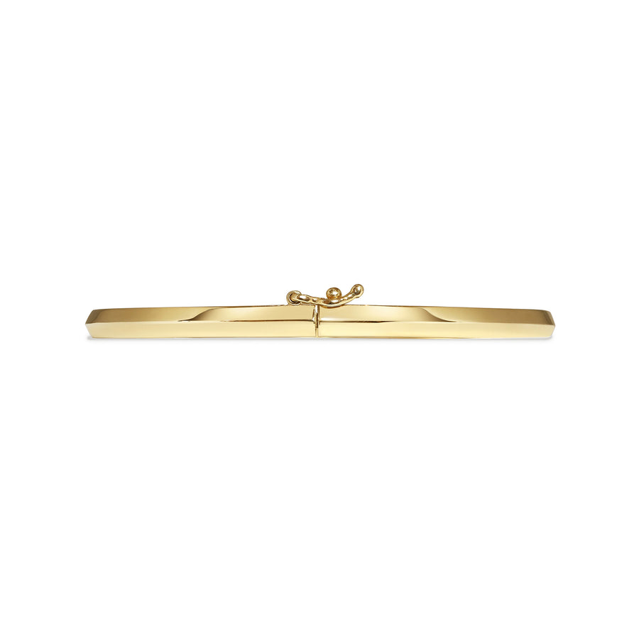 The Single Knife Edge Bangle by East London jeweller Rachel Boston | Discover our collections of unique and timeless engagement rings, wedding rings, and modern fine jewellery. - Rachel Boston Jewellery