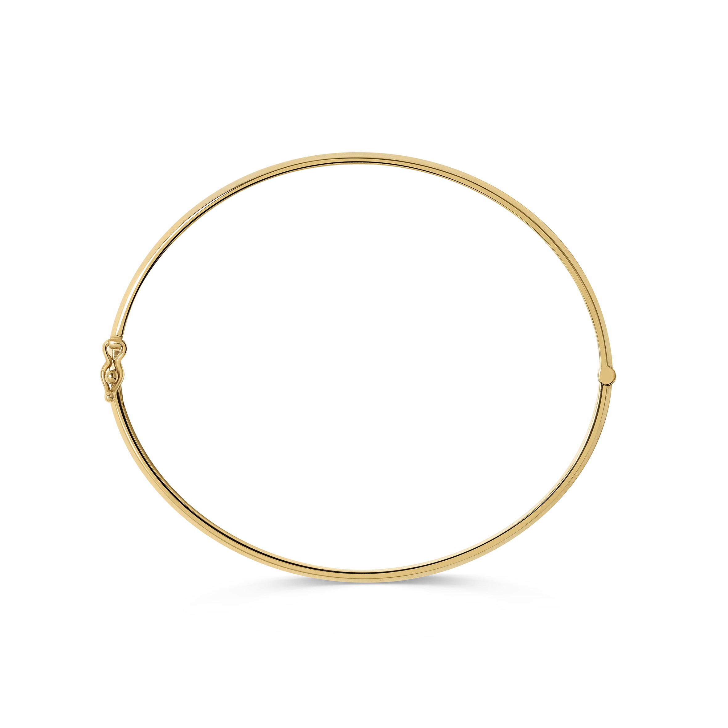 The Single Knife Edge Bangle by East London jeweller Rachel Boston | Discover our collections of unique and timeless engagement rings, wedding rings, and modern fine jewellery.