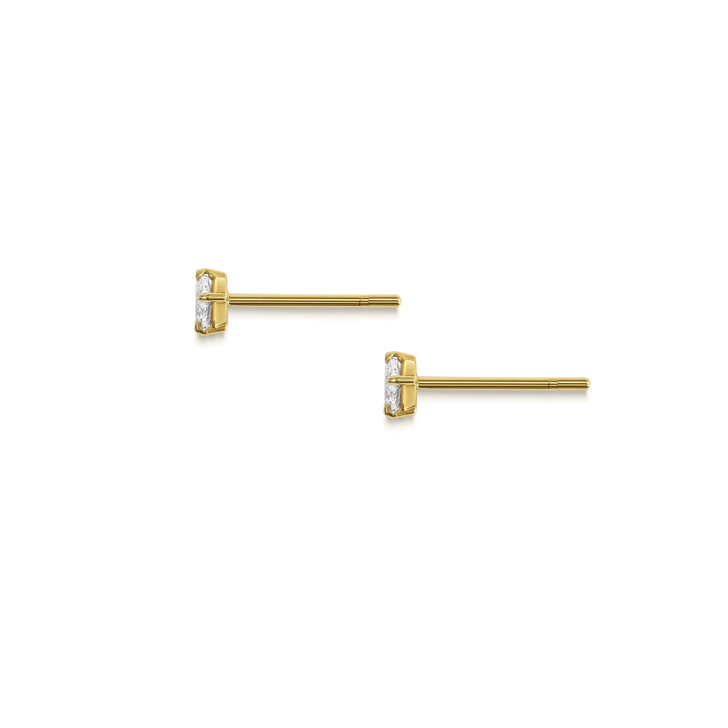 The Trillion Diamond Stud Earrings by East London jeweller Rachel Boston | Discover our collections of unique and timeless engagement rings, wedding rings, and modern fine jewellery.