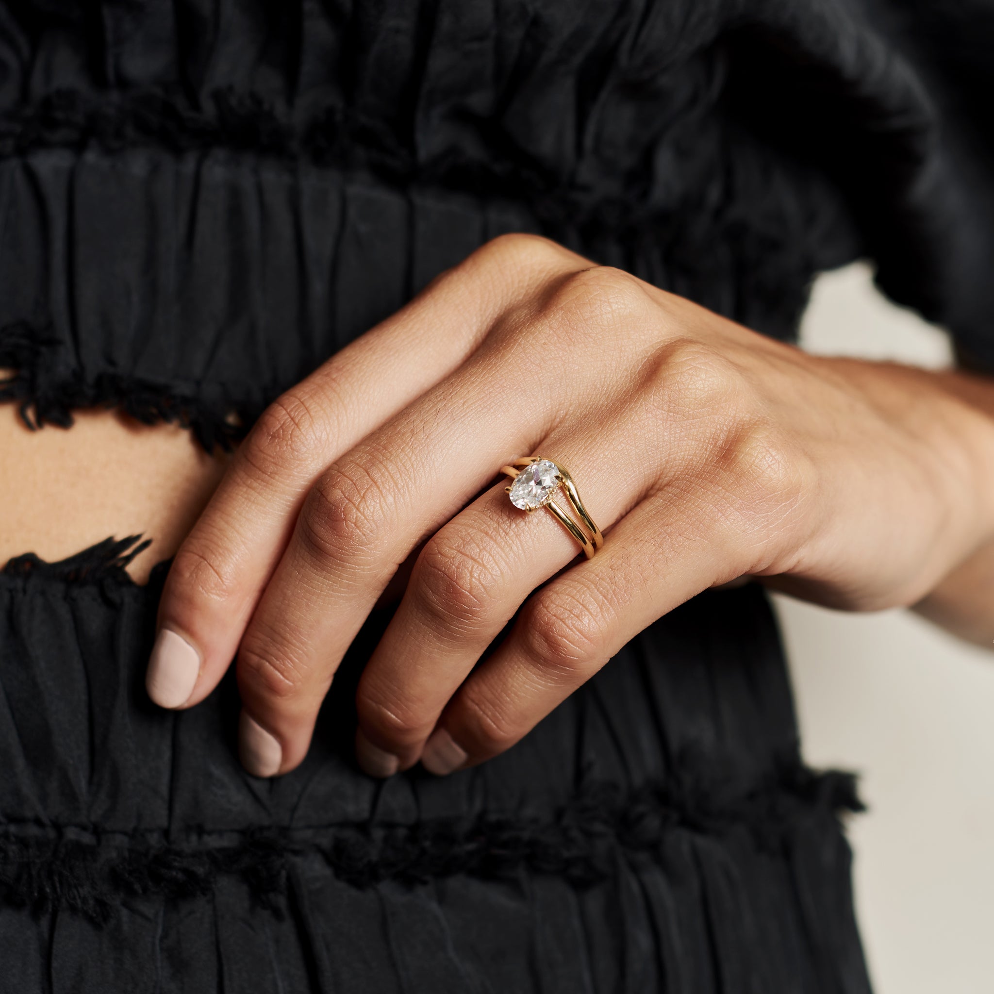 The D Shape Curve Band by East London jeweller Rachel Boston | Discover our collections of unique and timeless engagement rings, wedding rings, and modern fine jewellery.