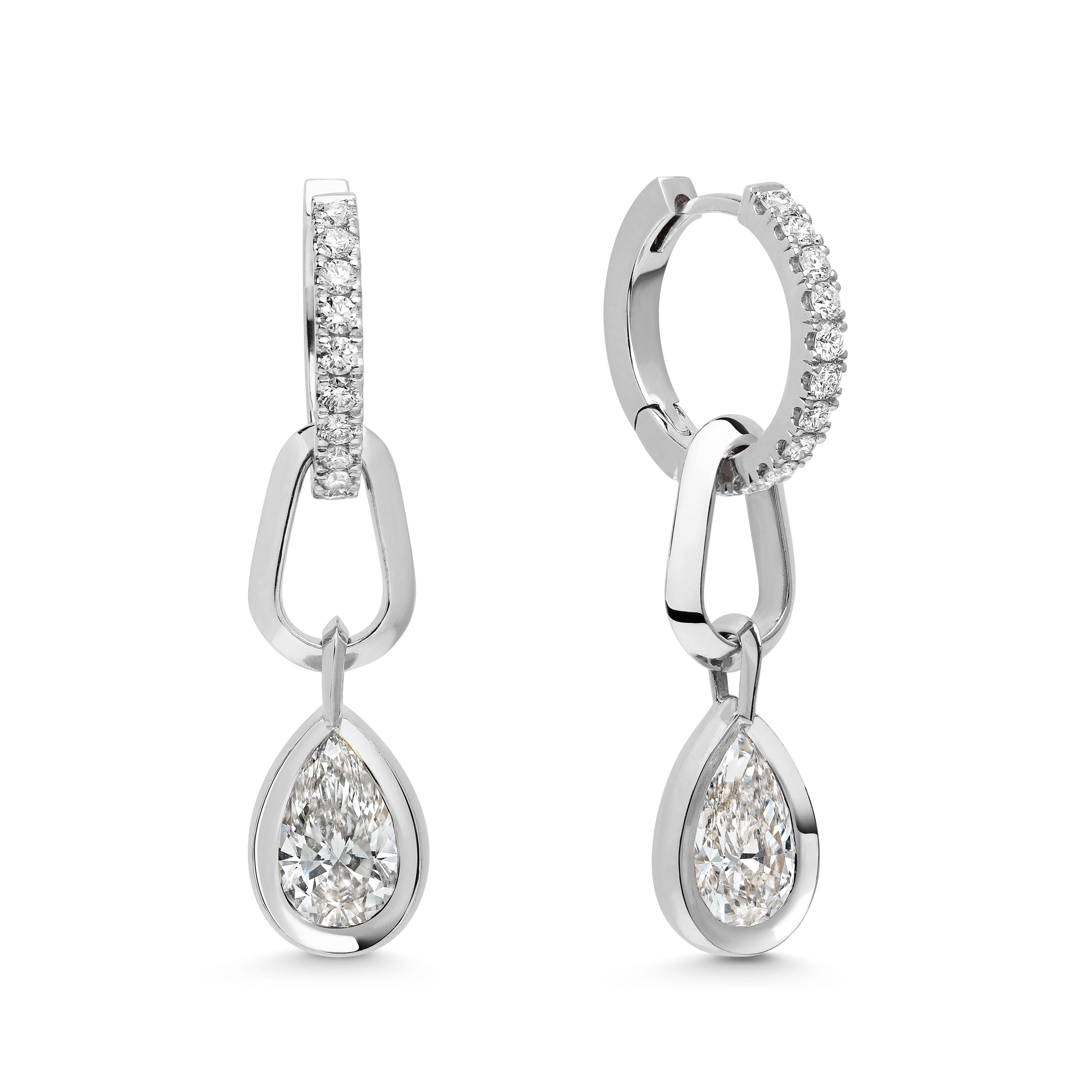 The Flow Earrings by East London jeweller Rachel Boston | Discover our collections of unique and timeless engagement rings, wedding rings, and modern fine jewellery.