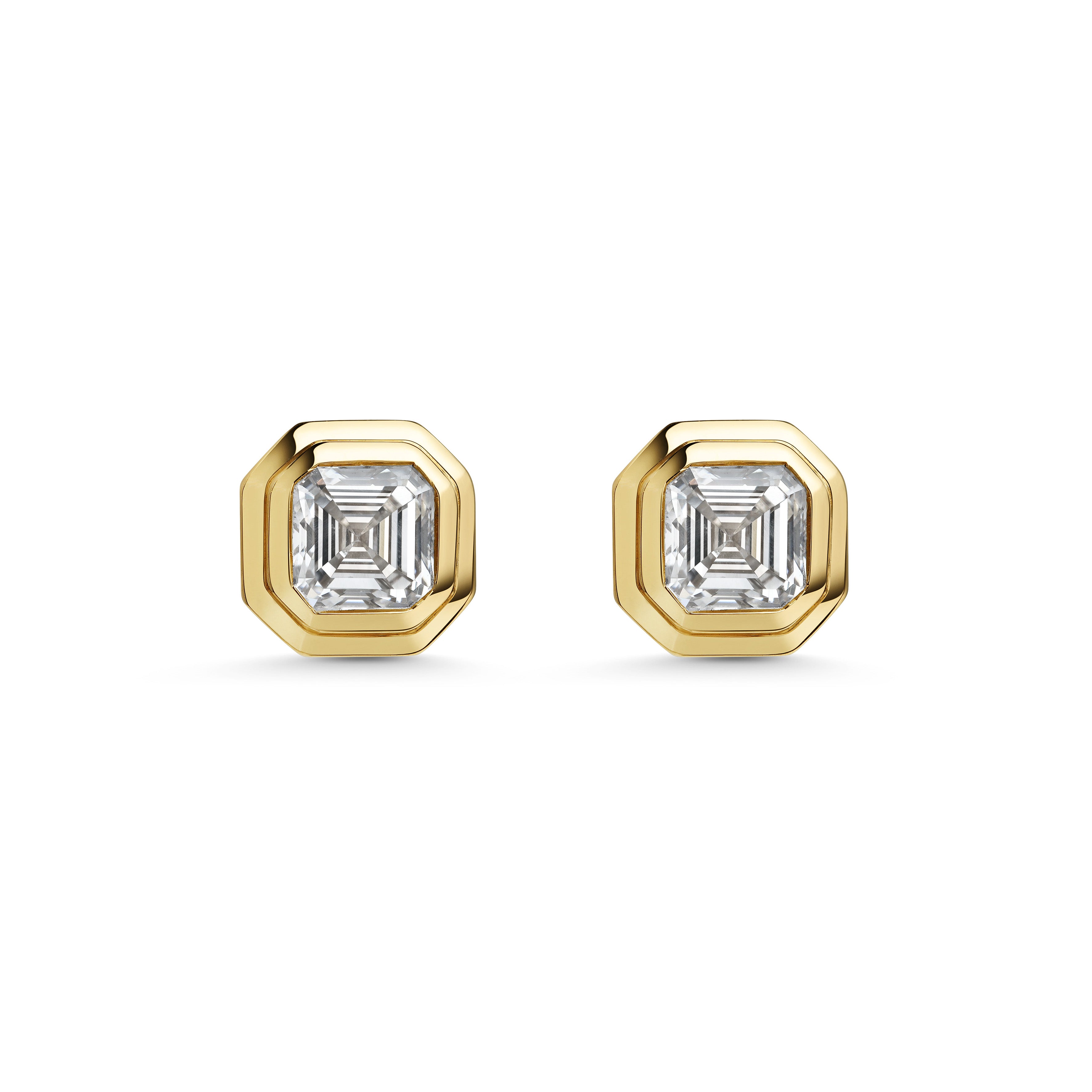 The RADIATE STUDS - ASSCHER CUT by East London jeweller Rachel Boston | Discover our collections of unique and timeless engagement rings, wedding rings, and modern fine jewellery.