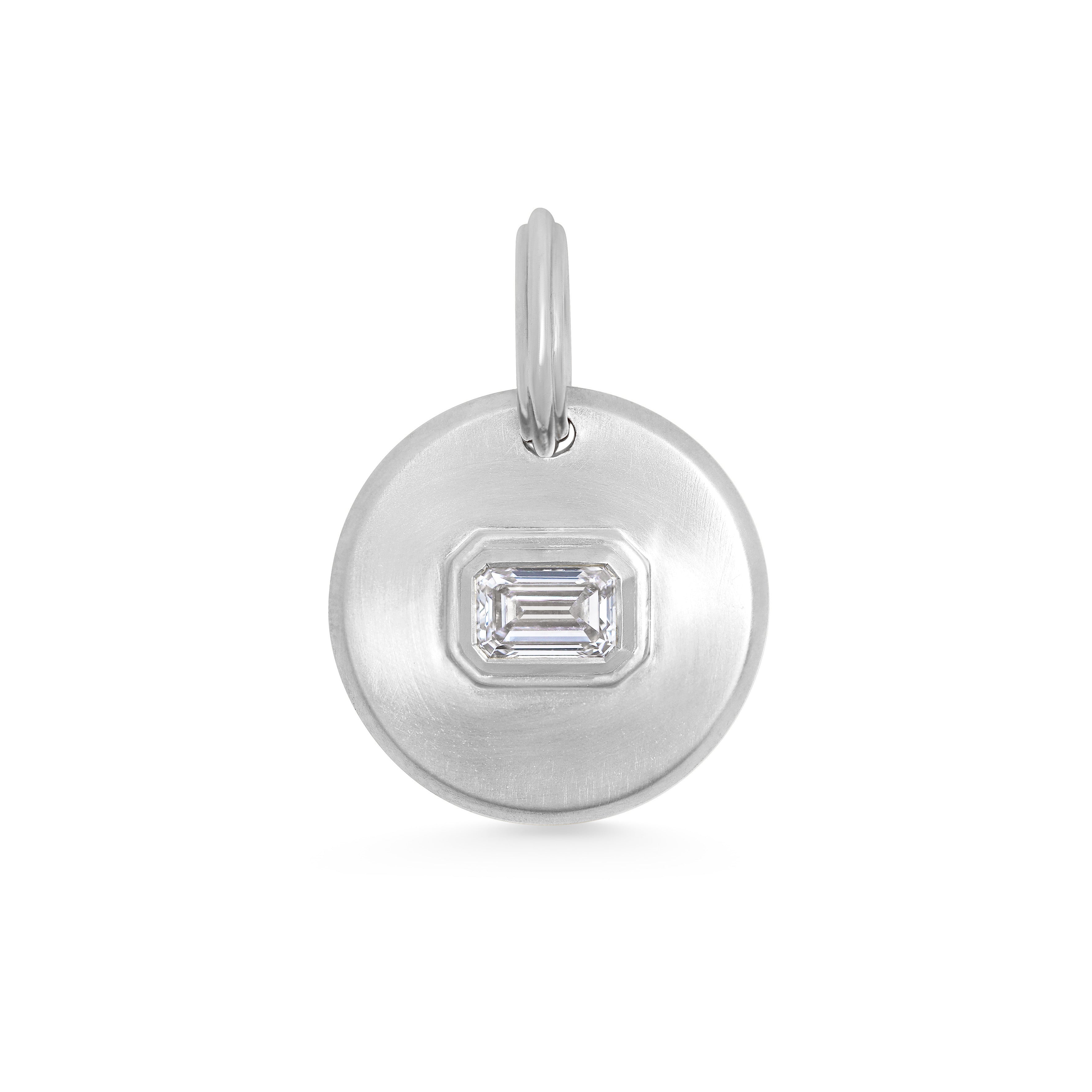 The Radiate Medallion - Emerald Cut by East London jeweller Rachel Boston | Discover our collections of unique and timeless engagement rings, wedding rings, and modern fine jewellery.