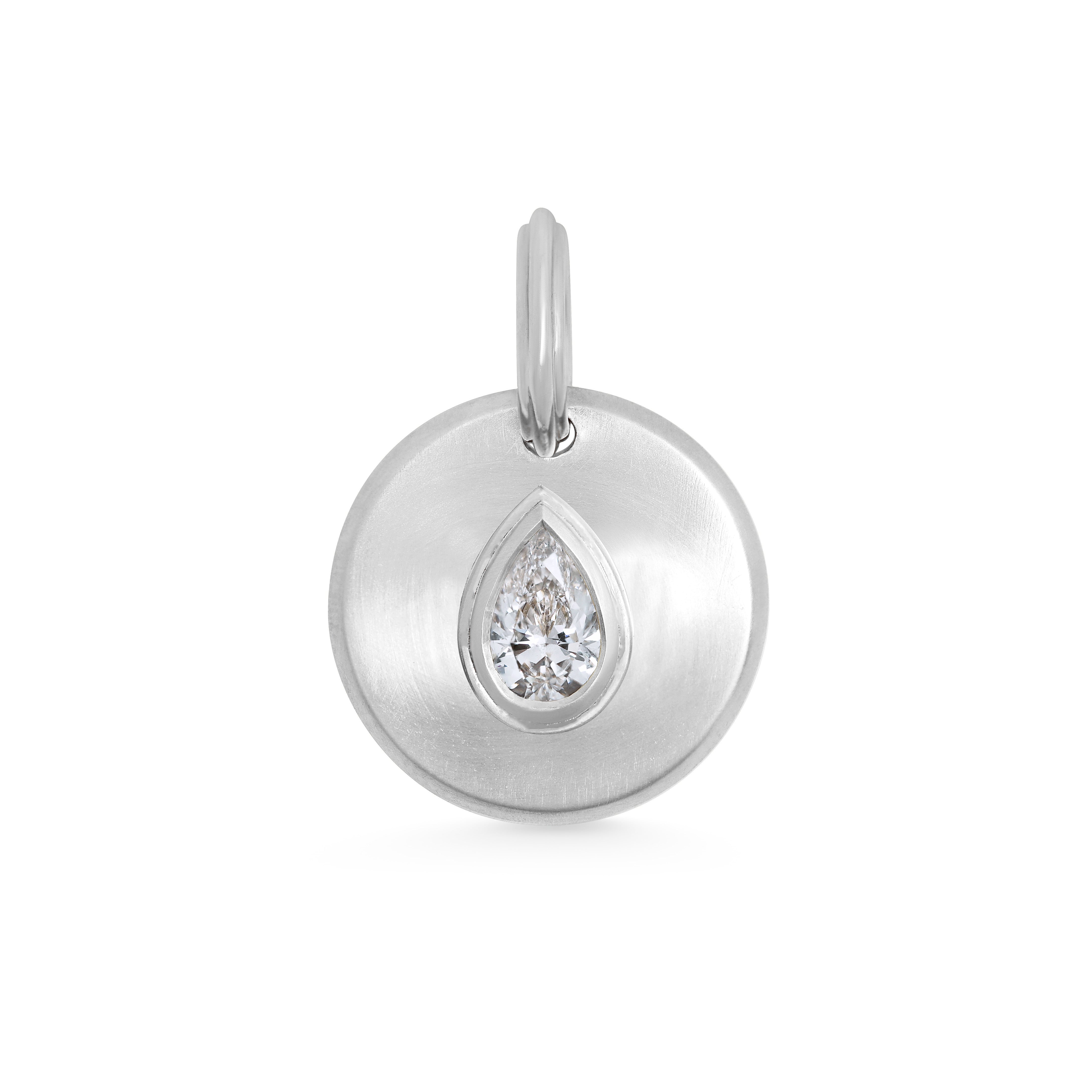 The Radiate Medallion - Pear Cut by East London jeweller Rachel Boston | Discover our collections of unique and timeless engagement rings, wedding rings, and modern fine jewellery.