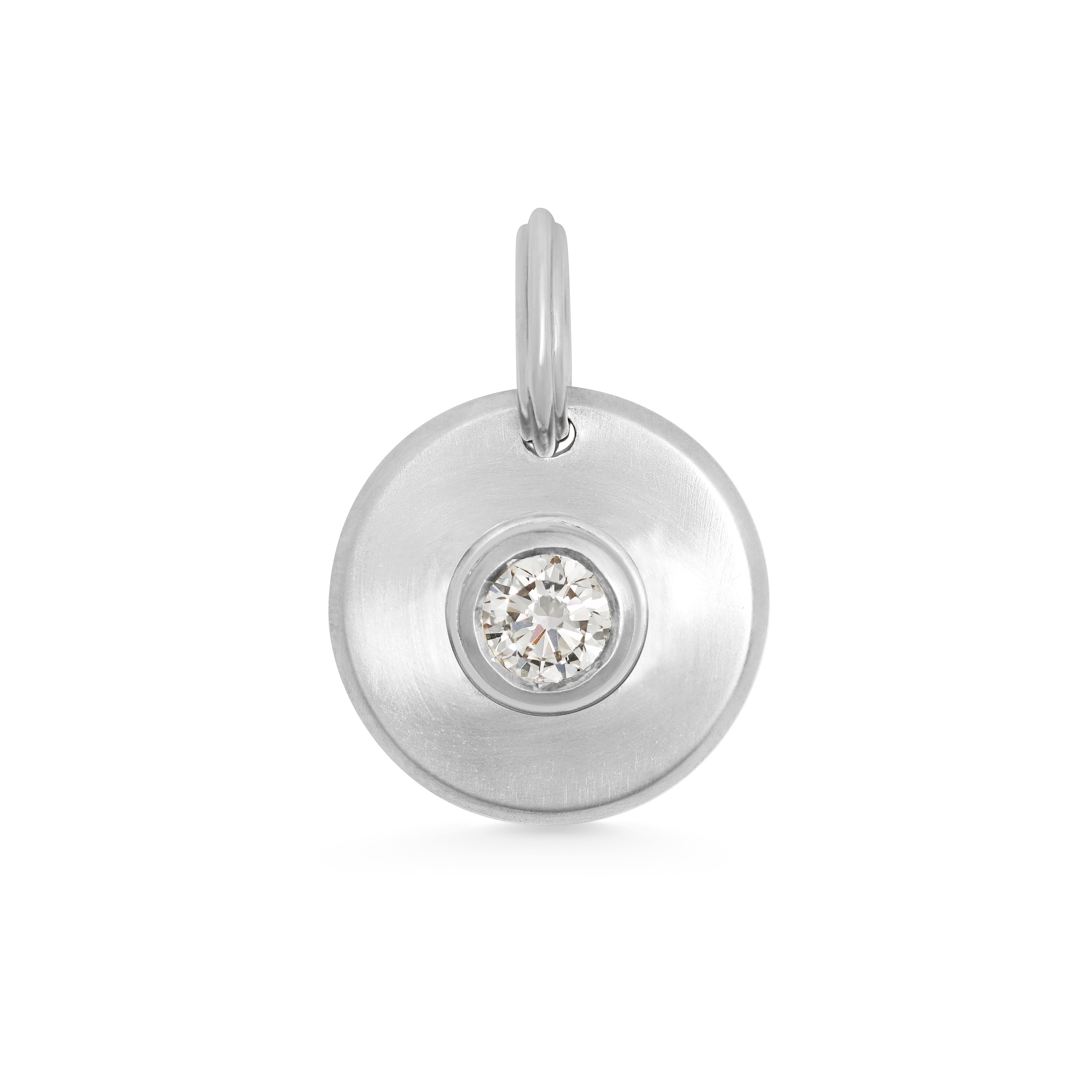 The Radiate Medallion - Round Cut by East London jeweller Rachel Boston | Discover our collections of unique and timeless engagement rings, wedding rings, and modern fine jewellery.