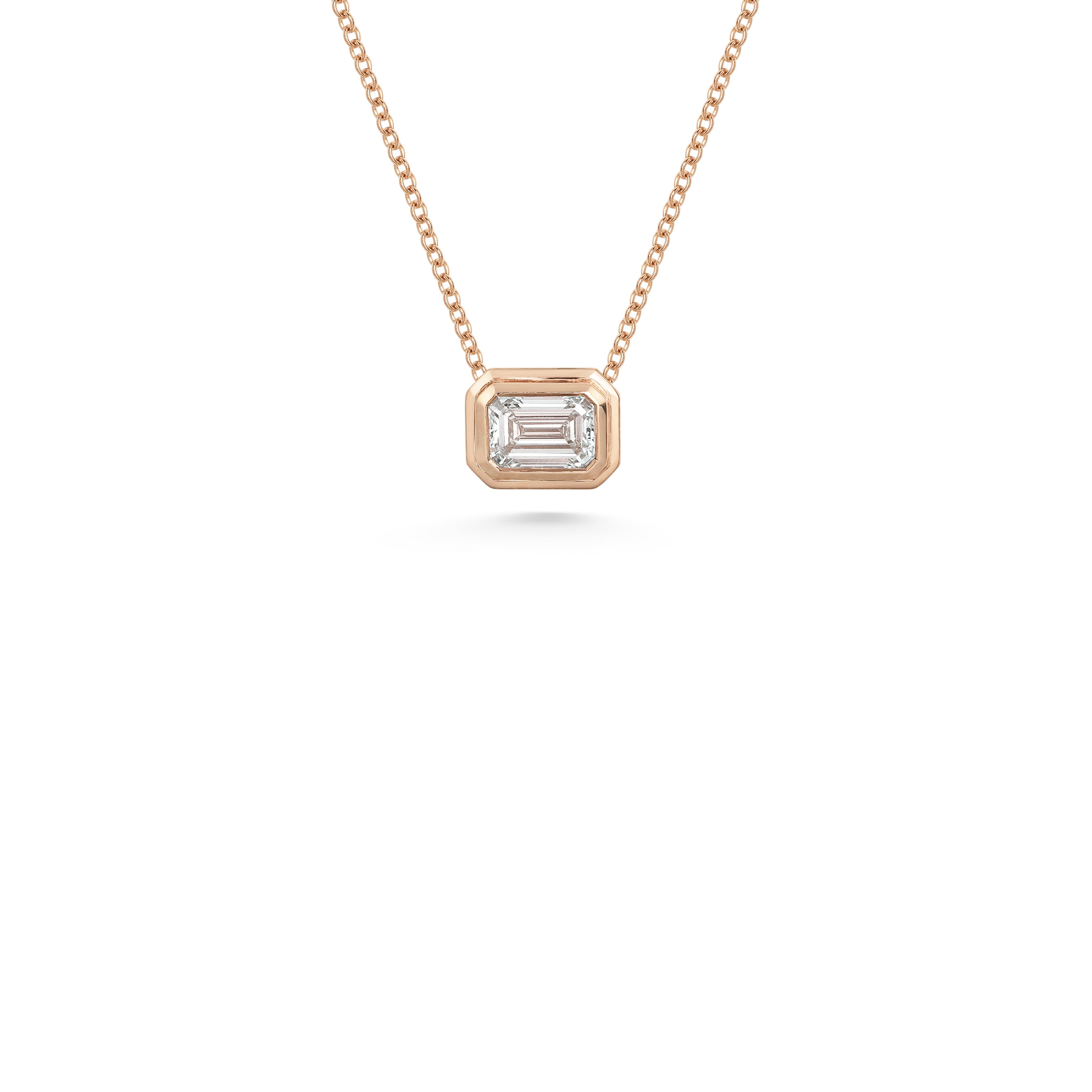 The Radiate Slider - Emerald Cut by East London jeweller Rachel Boston | Discover our collections of unique and timeless engagement rings, wedding rings, and modern fine jewellery.