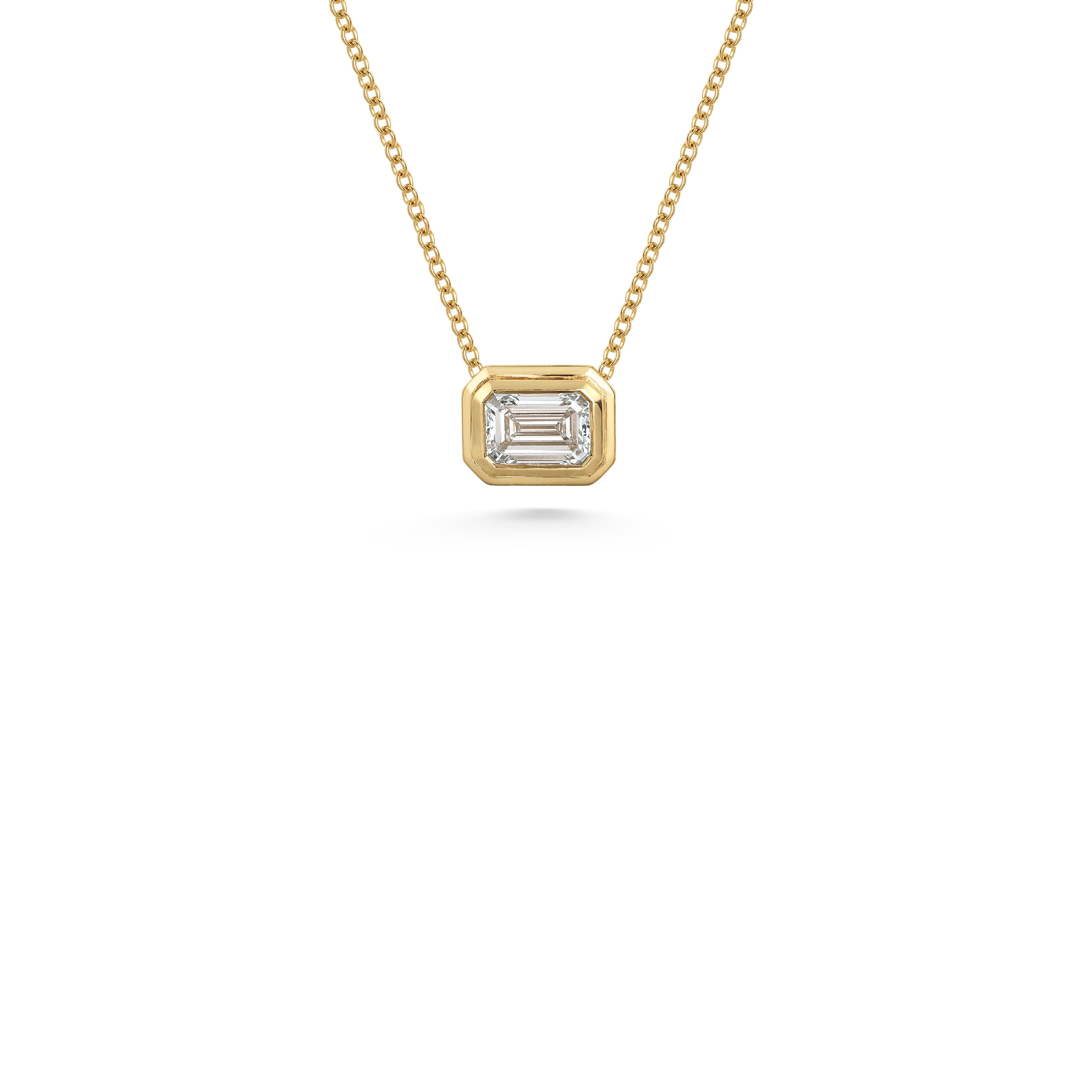 The RADIATE SLIDER - EMERALD CUT by East London jeweller Rachel Boston | Discover our collections of unique and timeless engagement rings, wedding rings, and modern fine jewellery.