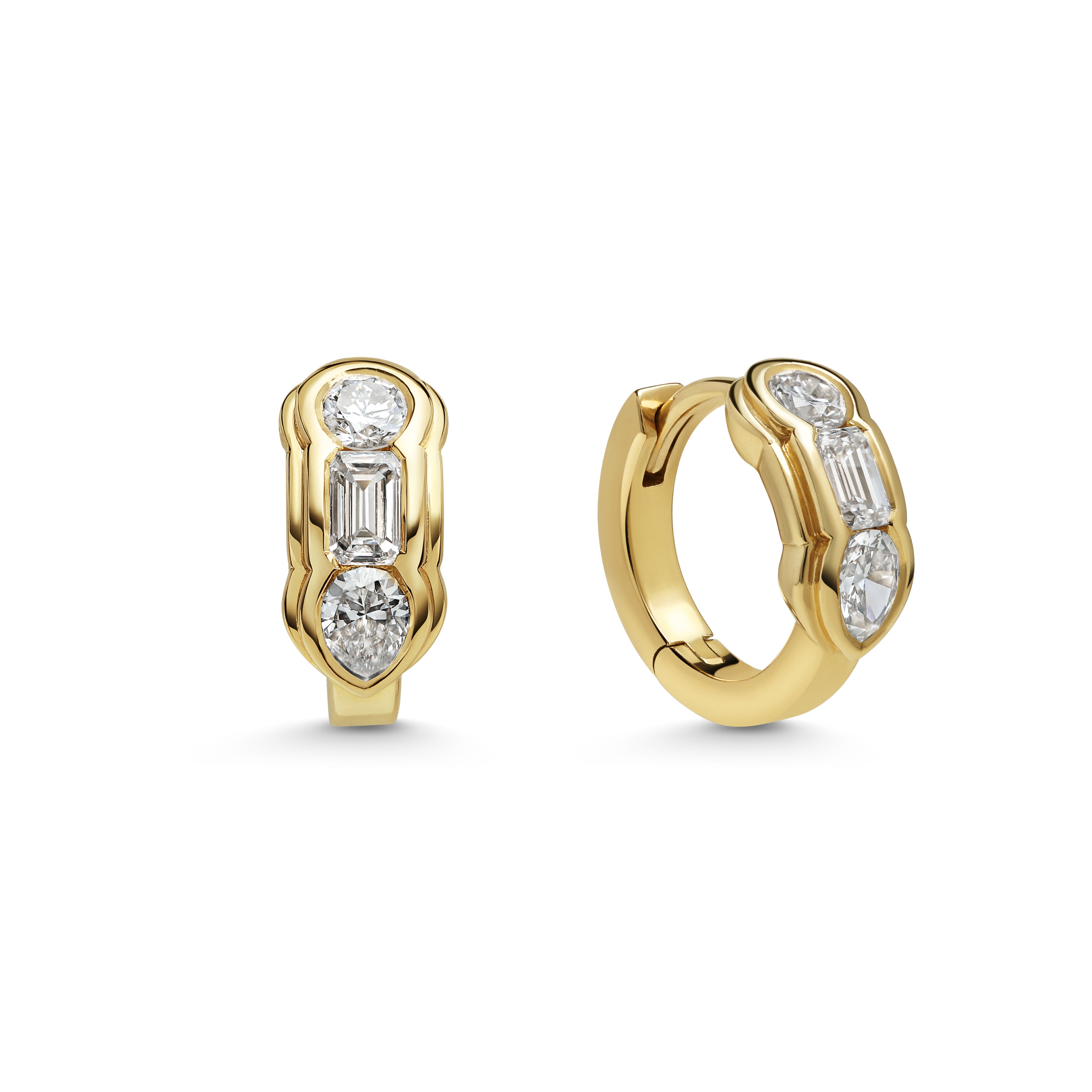 The RIPPLE HOOP EARRINGS by East London jeweller Rachel Boston | Discover our collections of unique and timeless engagement rings, wedding rings, and modern fine jewellery.