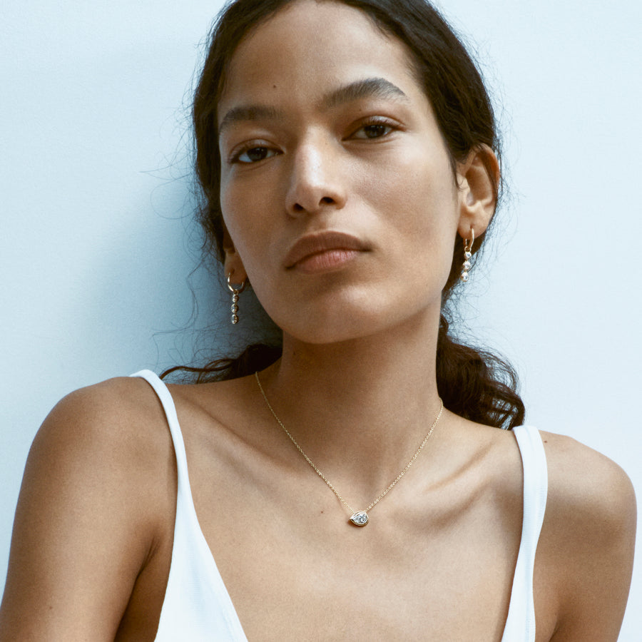 The RADIATE SLIDER - PEAR CUT by East London jeweller Rachel Boston | Discover our collections of unique and timeless engagement rings, wedding rings, and modern fine jewellery. - Rachel Boston Jewellery