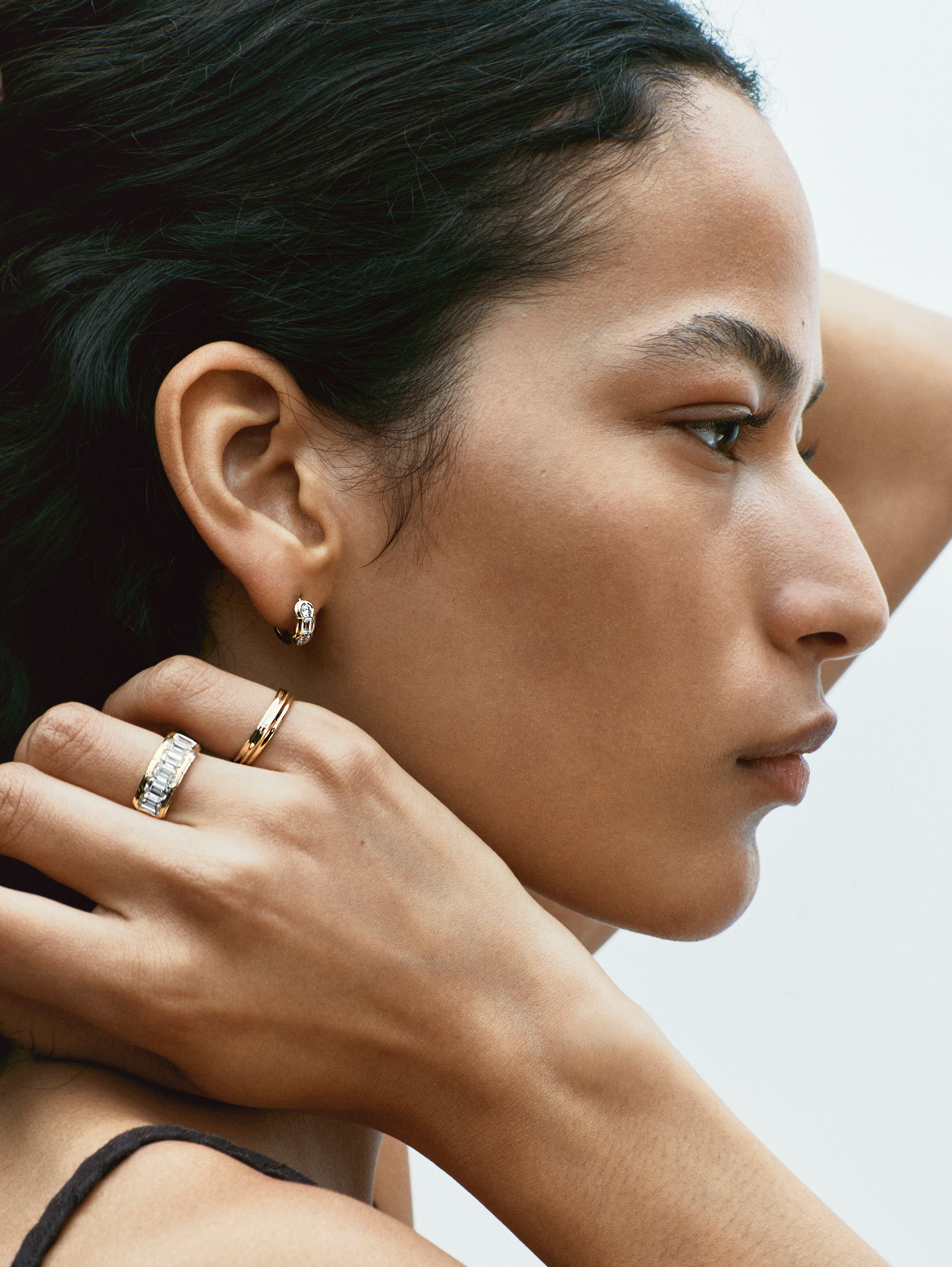 The BOUNDARY RING - EMERALD CUT by East London jeweller Rachel Boston | Discover our collections of unique and timeless engagement rings, wedding rings, and modern fine jewellery.