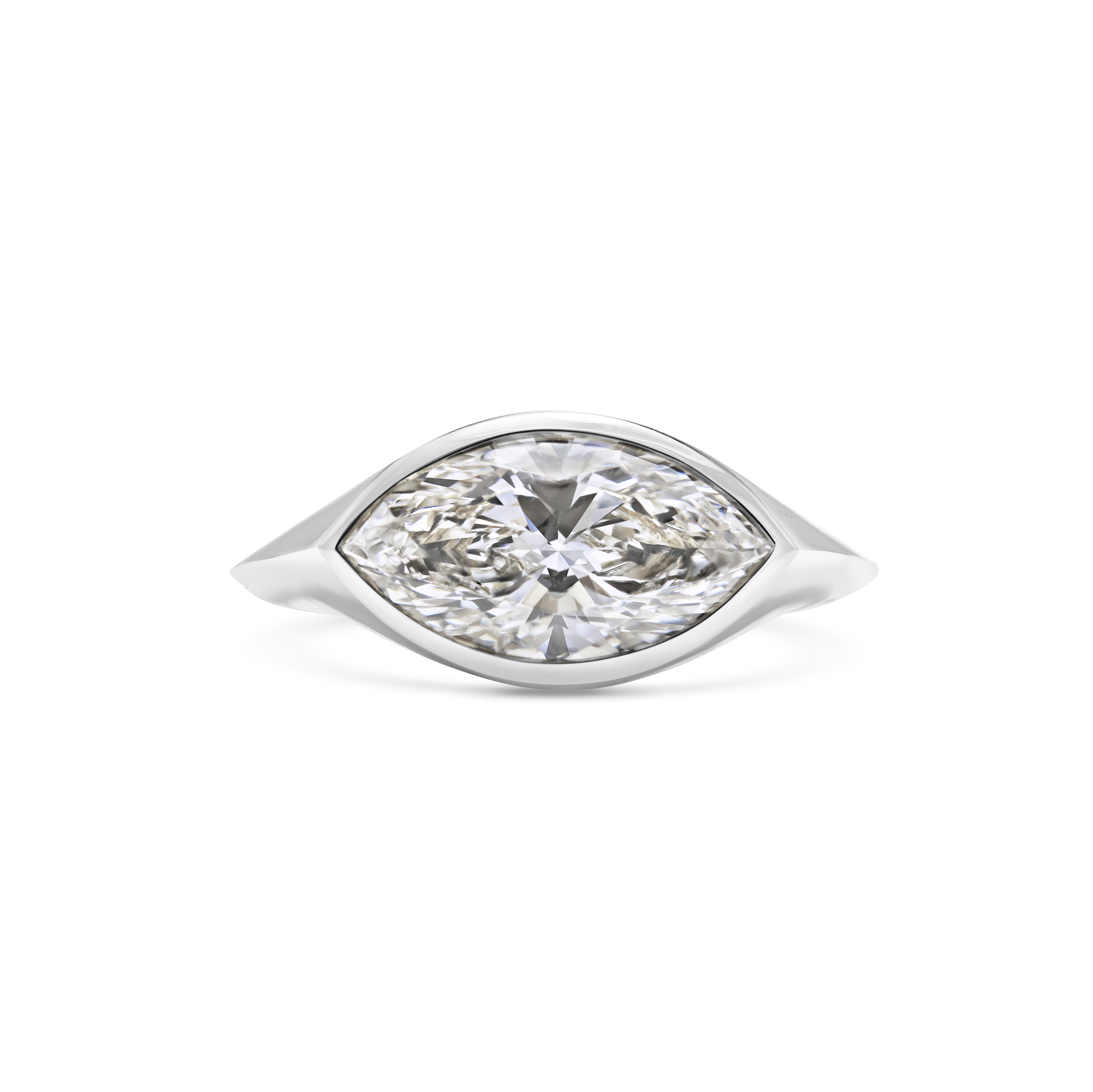 The Axis Ring by East London jeweller Rachel Boston | Discover our collections of unique and timeless engagement rings, wedding rings, and modern fine jewellery.
