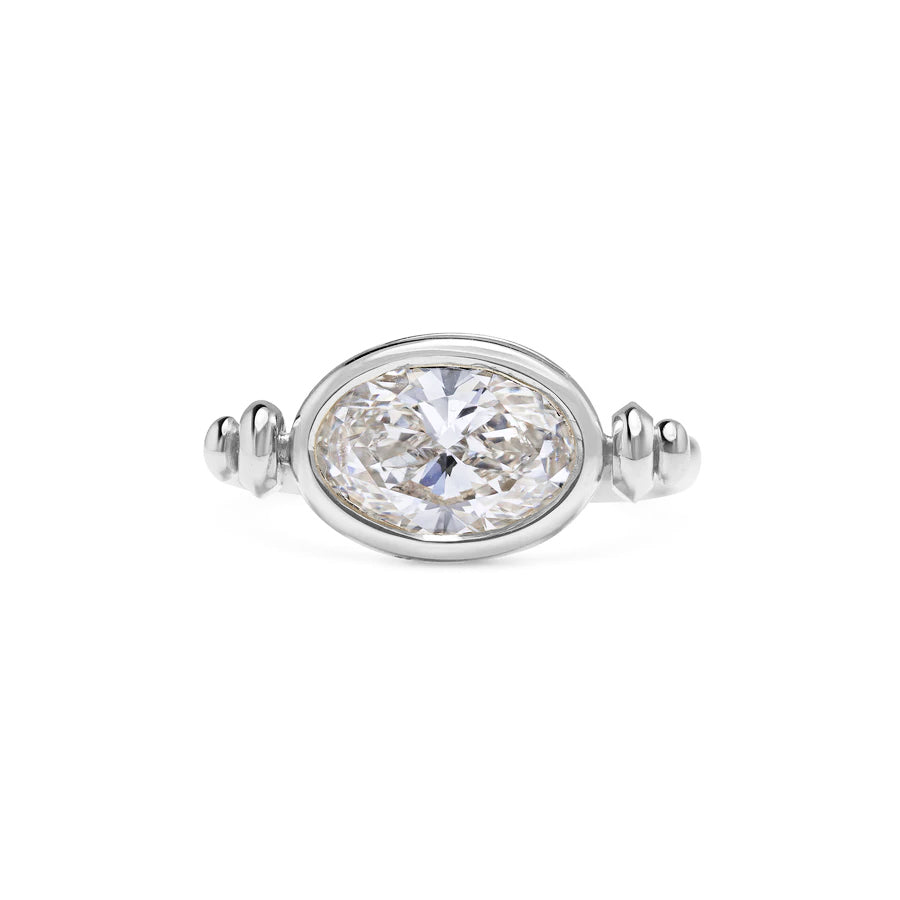 The Pivot Ring by East London jeweller Rachel Boston | Discover our collections of unique and timeless engagement rings, wedding rings, and modern fine jewellery.