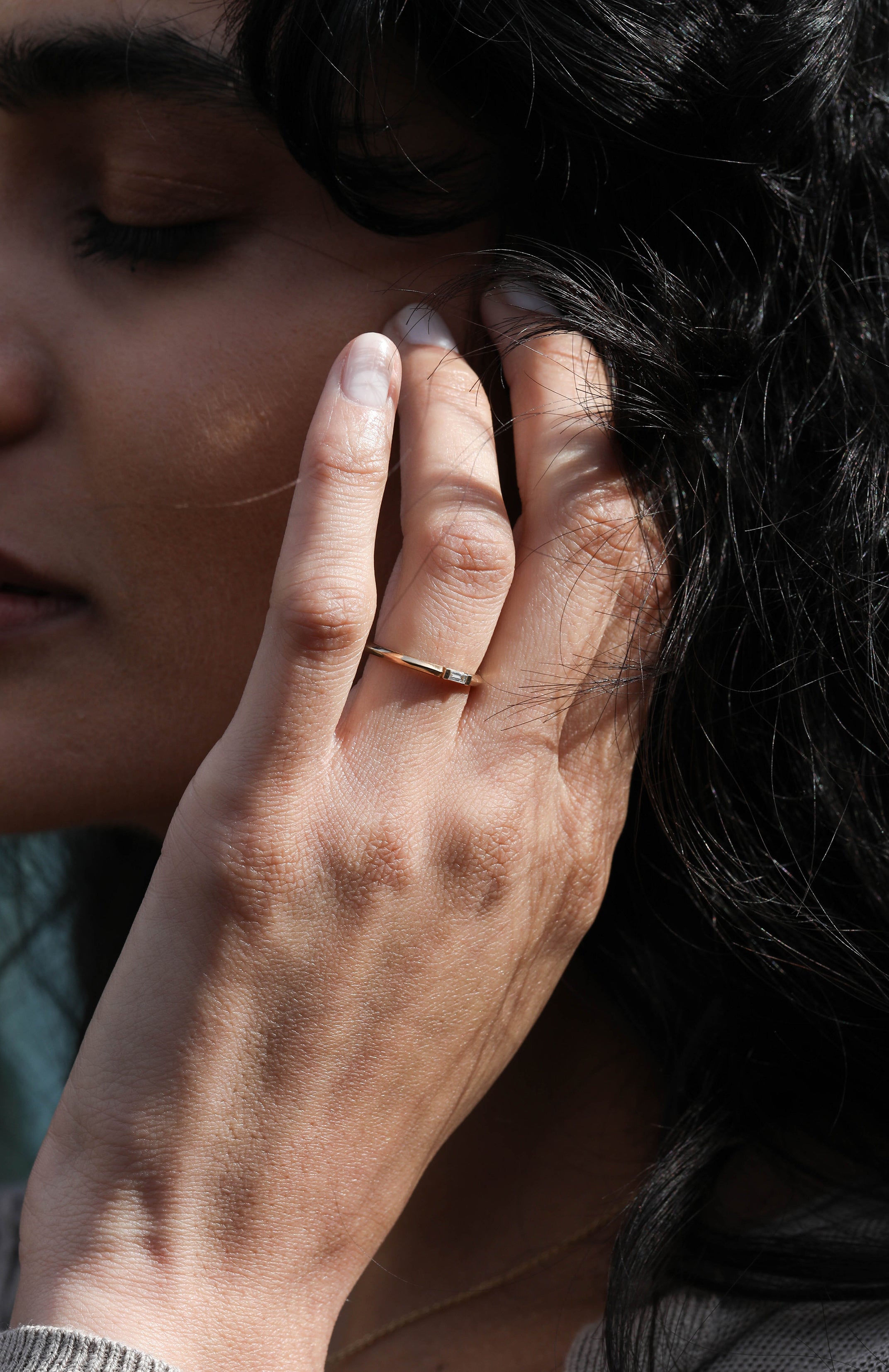 The Baguette Ring by East London jeweller Rachel Boston | Discover our collections of unique and timeless engagement rings, wedding rings, and modern fine jewellery.
